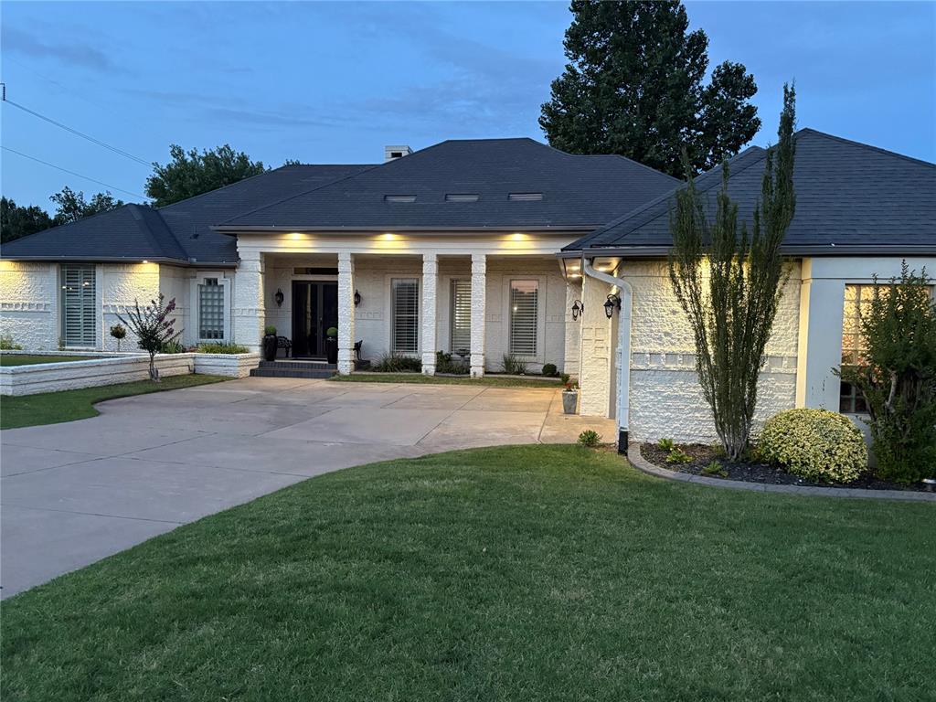 Located in the heart of Edmond on a spacious 0.76 acre lot, this unique floor plan offers 3 bedrooms plus a dedicated office, looking out to a deck that could easily be used as a 4th bedroom, along with 2.5 bathrooms  and a 3-car attached garage. This home perfectly blends comfort, functionality, and space. Step inside to an open-concept layout featuring a welcoming living area highlighted by a stunning triple-sided fireplace seamlessly connects to the  dining area and kitchen--ideal for both everyday living and entertaining.  The kitchen is equipped with stainless steel appliances, granite counter tops and offers both style and practicality.  Ideal for both everyday living and entertaining.  Enjoy year-round relaxation in the expansive sunroom overlooking the beautiful backyard and waterfall on the deck. Additional upgrades include Villa Belize Collection wood flooring, a whole-house Generac generator, Full House Surge Protector, newer hot water heaters, R-38 insulation and custom California closets for optimal organization. Outdoor living is just as impressive, with multiple decks spanning the back of the home, a gazebo for additional seating, fire pit and plenty of space to enjoy the peaceful surroundings.  Conveniently located with easy access to I-35, this property offers both privacy and accessibility in one of Edmond's most desirable areas. Seller is a licensed Realtor.  Seller is also willing to consider selling select furniture. Schedule your private showing today--this one won't last long!