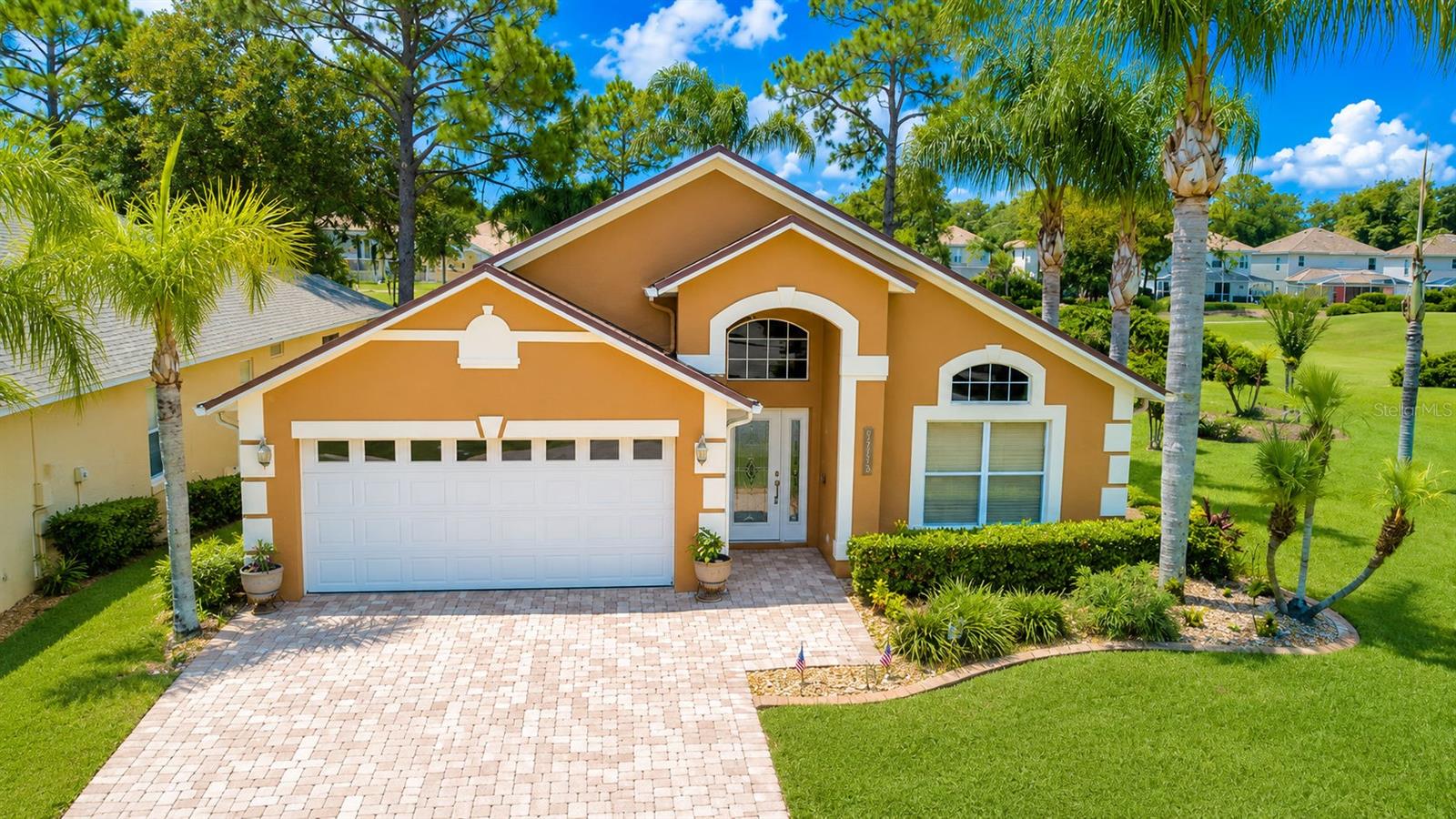 Enjoy golf course living with a private screened pool and direct views of the fairway right from your backyard. This 4-bedroom, 2-bath home is situated on a spacious corner lot in the gated Southern Dunes Golf & Country Club community in Haines City. The paver driveway adds curb appeal, while the screened pool and lanai feature an outdoor kitchen, creating an ideal space for relaxing or entertaining while overlooking the golf course. The home also includes the added peace of mind of a whole-house generator.Inside, you’ll find a split-bedroom floor plan with a spacious living and dining room, a kitchen that opens to the family room, and a private primary suite with a large walk-in closet and an en-suite bath featuring dual vanities, a soaking tub, and a separate shower. Three additional bedrooms and a full bath are located on the opposite side of the home. Conveniently located near shopping, dining, and I-4, Southern Dunes offers outstanding community amenities and an exceptional golf course lifestyle. Schedule your private showing today.