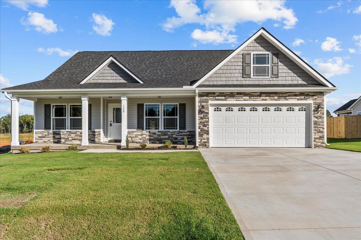 Custom built by local builder! Whitney plan with tons of upgrades. Luxury Vinyl Plank flooring. Granite countertops. Stone accents. Master bath upgrade. Patio upgrade. Must See! *Photo shows same house plan fully complete, not subject property.