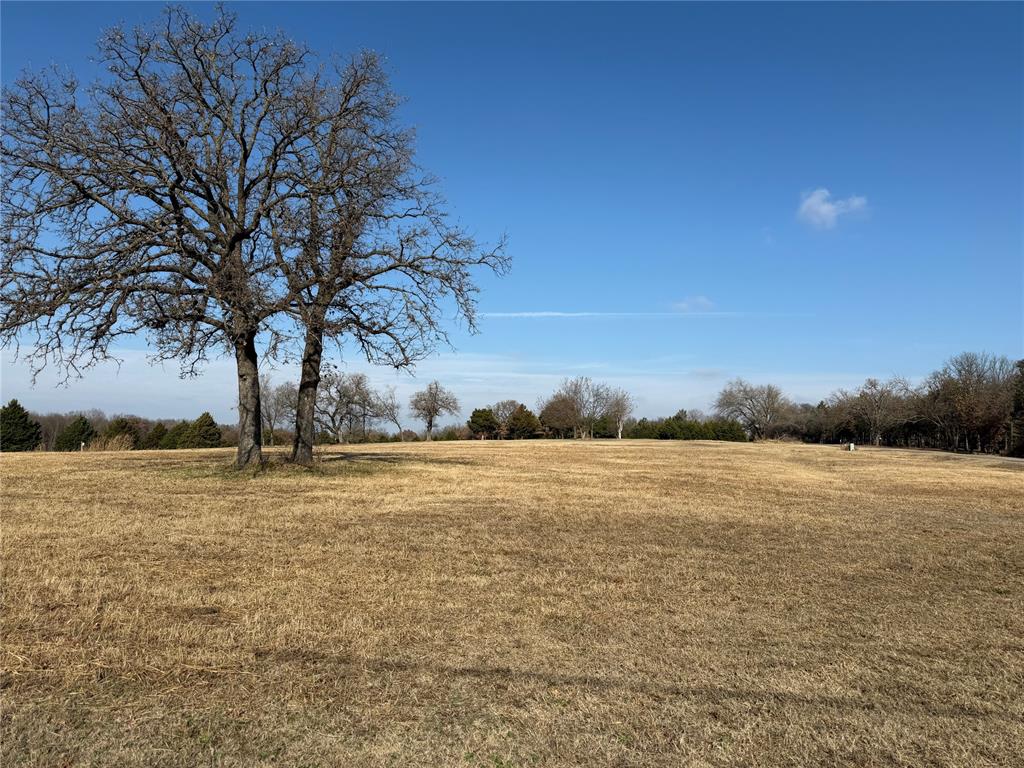 Prime location for building your dream house with views of Lake Arcadia. Set on Hwy66 and possible to be zoned L5 for greater value