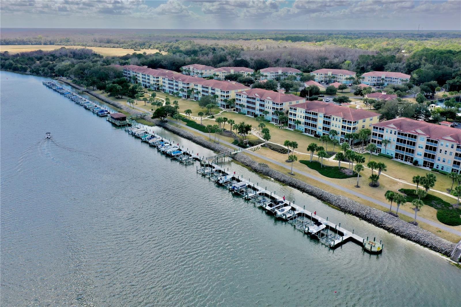 Very nice condo on top floor, bright & airy open floor plan, that has a fantastic lanai overlooking the ICW and Marina. The kitchen that is open to the great room boasts solid surface counter with a large windows, double sinks, pantry, all appliances. The master suite is a nice size with a large window looking out over the ICW. The master bath area has a walk-in closet, double vanity and a large walk-in tiled shower. Washer and dryer included. The Community features a Clubhouse & Fitness Center, Swimming Pool & Spa, Outdoor Kitchen & Barbecue Area, Private Marina, Walking and Biking trails. Basic Cable and Internet is included. Fully furnished. Boat slip available for rent.