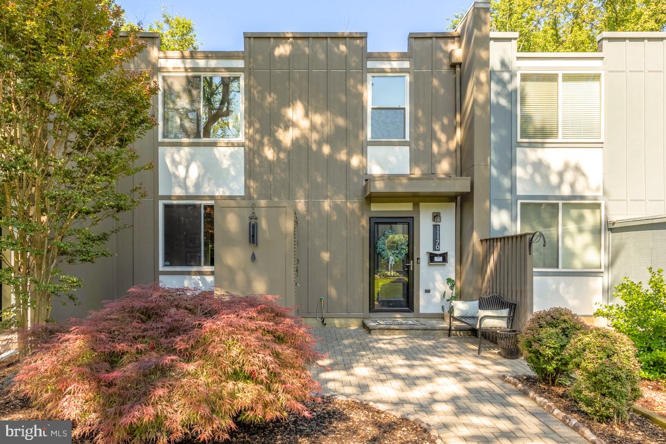 Tucked into the Forest Edge Cluster just shy of a mile from Lake Anne, 11170 Forest Edge Drive is one of only 12 homes with this floor plan — and it shows up differently than anything else at this price point. This home is 24 feet wide, and you feel that as soon as you walk in.  Roof( 2019), Windows (2019), HVAC and water heater (2024), Siding (2024), Gutters (2019), Exterior doors (2019), Powder Room (2025), New Vanities, lighting, and fixtures in all bathrooms (2025). This home is 24 feet wide, and you feel that as soon as you walk in. Inside, there's real space: four sizable bedrooms, three full bathrooms, a stylish new powder room, an elegant kitchen, a dining room that comfortably seats eight to ten, and not one but two generous living areas. This is a home that can actually hold your life. Upstairs, there are hardwoods throughout (2 bedrooms have carpet and one has the hardwoods exposed). And then there's the setting. Pull into this neighborhood, and you may genuinely wonder if you've stumbled into a European village — because someone actually thought about the green space. Front yards. Front patios. Outdoor storage. Community benches. Mature trees with birds in them. Flowers coming up everywhere. This is not a parking lot with a few shrubs. Walk to Forest Edge Elementary. Stroll to Uplands Pool, tennis, pickleball, the Lake Anne Farmer's Market, or the lake itself. Catch the Fairfax Connector straight up to Wiehle Ave Metro when you need to. One assigned spot (#70), plenty of unassigned parking. Quarterly Cluster dues are $447 and include trash and snow removal. The annual Reston Association dues are $890, which include access to all pools and tennis/pickleball facilities.