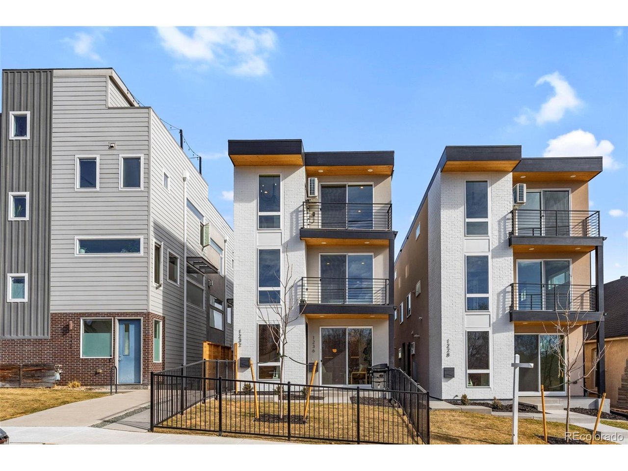 Ask us about our preferred Lender incentives for this home!! Modern living meets unbeatable location in this brand-new,front-facing duplex just blocks from Sloan's Lake and right next to the light rail. Designed for both style and functionality,this stunning front/back duplex offers no HOA, a 1-car detached garage, and thoughtful details throughout. The main levelis light, bright, and open, featuring a welcoming living space, a sleek kitchen with pantry, and a convenient half bath.Large windows and a walk-out patio create seamless indoor-outdoor flow, perfect for morning coffee or eveningunwinding. On the second level, you'll find two bright bedrooms, each with its own private ensuite bathroom. The primarysuite features a walk-out balcony, offering a quiet retreat with fresh air and neighborhood views. The third floor is ashowstopper: an expansive open loft ideal for entertaining or relaxing, complete with a wet bar, mini-split systems foradded comfort, another walk-out balcony with western facing views. top that off with a bedroom and full bathroom,perfect for guests, a home office, or flex space. With abundant natural light, modern finishes, and a location that putsSloan's Lake, dining, trails, and transit right outside your door, this home delivers the best of Denver living with zerocompromises.