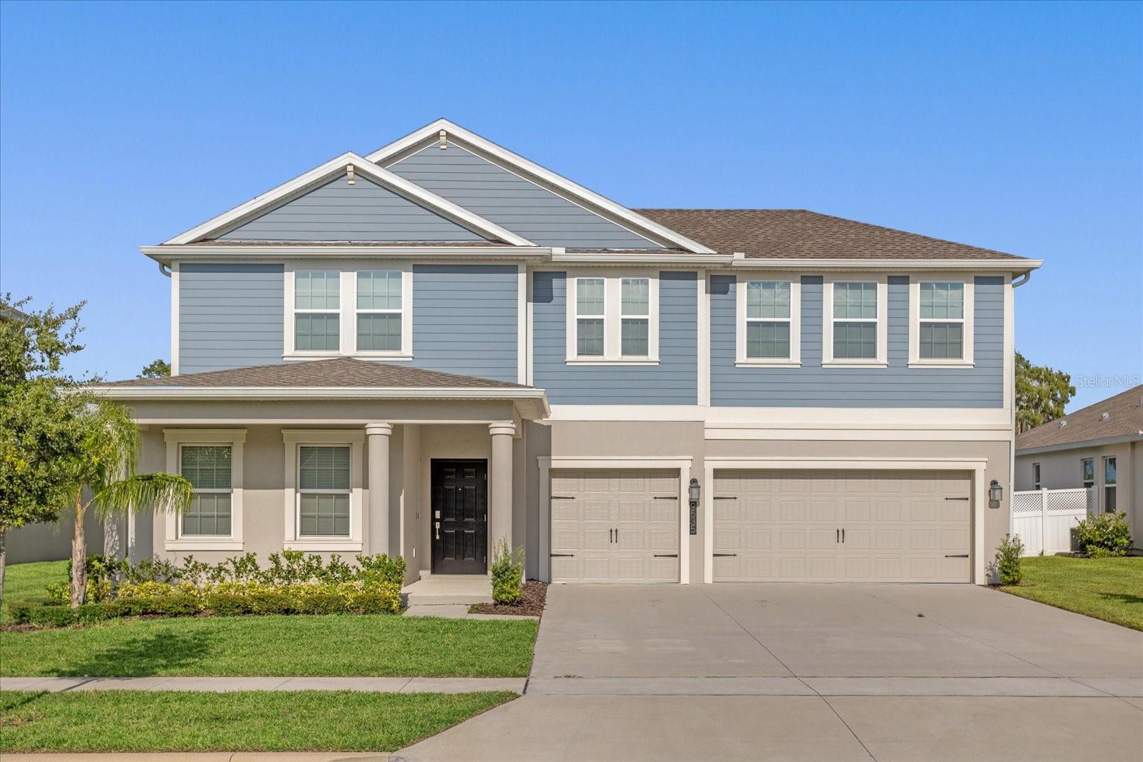 **Welcome to 9535 Beautiful Way in the desirable Storey Grove community of Winter Garden!** This stunning 4-bedroom, 3.5-bath home offers over 3,450 square feet of thoughtfully designed living space and backs to a private conservation area with tranquil water views. Built in 2021, this home features an open floor plan with wood-look tile throughout the main level, high ceilings, and abundant natural light.

The gourmet kitchen is a chef’s dream, showcasing quartz countertops, an oversized island, stainless steel appliances, a large pantry, and a built-in wet bar—ideal for entertaining. The spacious first-floor primary suite includes tray ceilings, a spa-like bath with dual vanities, a soaking tub, and a large walk-in closet with direct access to the laundry room.

Upstairs, enjoy a versatile loft space perfect for a media room, playroom, or office. Step outside to a covered and screened patio overlooking a peaceful backyard with no rear neighbors—perfect for relaxing or hosting guests. Additional features include a 3-car garage, irrigation system, and HOA-maintained lawn care.

Storey Grove offers resort-style amenities, including a clubhouse, fitness center, resort pool, multiple playgrounds, dog parks, and walking trails. Conveniently located near Horizon West schools, a new Publix shopping center, and major highways (SR 429 & US 192), and just minutes from Walt Disney World.

**Don’t miss the opportunity to own this beautiful, move-in-ready home in one of Winter Garden’s fastest-growing communities!**