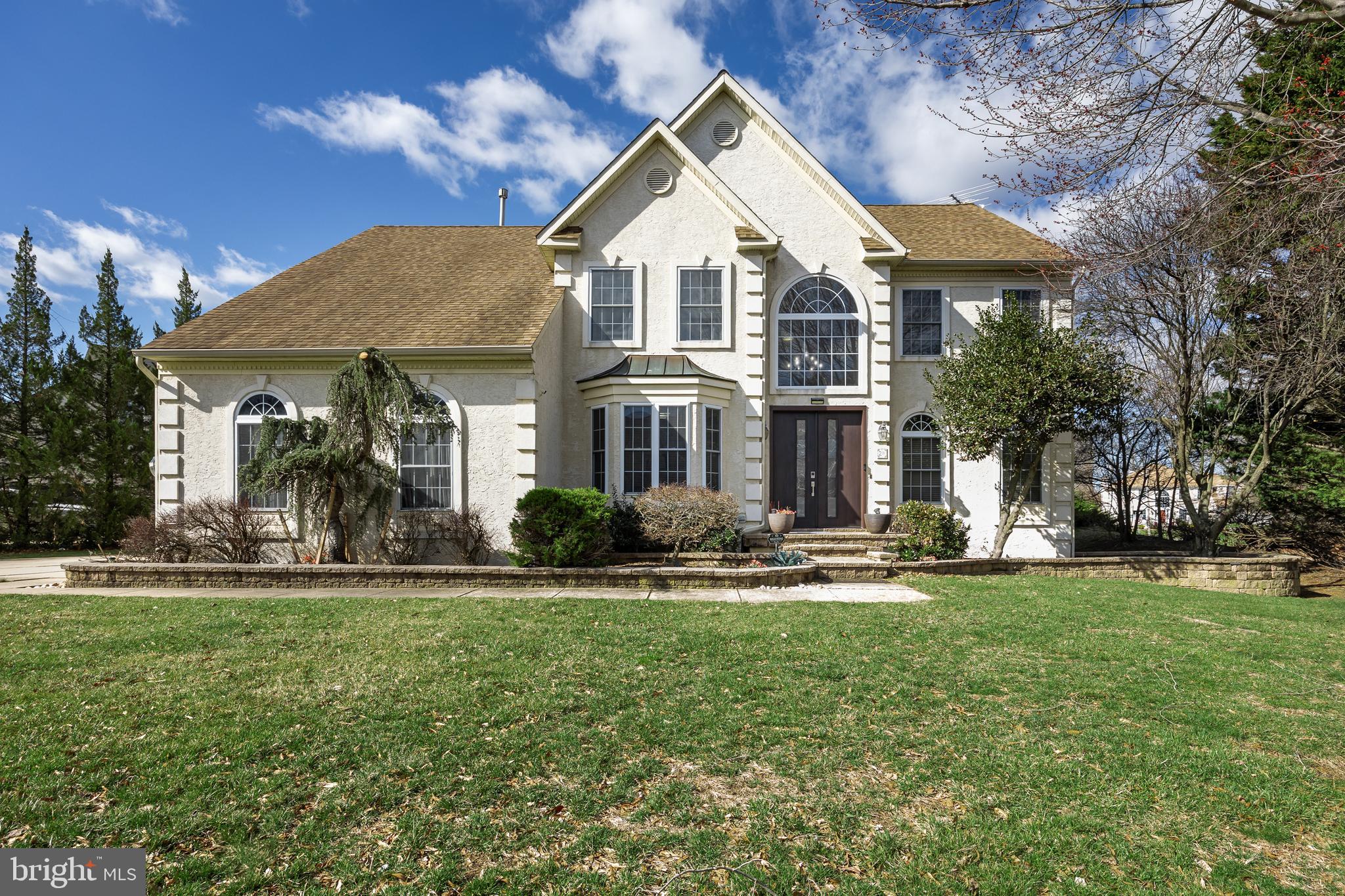 Not Your Typical Bobby’s Run Home—2 Rothbury Drive Is Grand, Luxurious, Bright, Open, And Immaculately Clean, With Expansive Living Spaces, High-End Finishes And Lighting, And Custom Millwork Throughout. Simply Stunning At Every Turn! This Spectacular 4 Bed, 2.5 Manchester Model  Blends Style, Sophistication, And Just The Right Touch Of Hollywood Glam In One Of Lumberton’s Most Beloved Neighborhoods! Oversized, Grand Double Doors Make Quite The Statement As The Entry Way Welcomes You Into A Striking Foyer Featuring A Stunning Wrought Iron Staircase, Seamlessly Lined With LVP Flooring On The Steps. Just Off The Foyer, A Private Office With Double French Doors Offers The Perfect Work-From-Home Setup. Elegant Living And Dining Rooms Sit Just To The Right Of The Foyer, Open To One Another And Finished With Tile Flooring Showcasing A Custom Mosaic Pattern. A Gorgeous Two-Toned Chef’s Kitchen With An Oversized Island Highlighted By Pendant Lighting, A Built-In Desk Area, And Stainless Appliances Opens To An Expanded Great Room With Soaring Cathedral Ceilings, A Floor-To-Ceiling Stone-Lined Gas Fireplace Accented By Beautiful Half-Arched Windows, And A Convenient Back Staircase.Completing The First Floor Are  A Well-Appointed Laundry/Mud Room With Abundant Cabinetry And A Swanky Half Bath. Upstairs, The Luxurious Primary Suite—Truly Fit For Royalty—Features A Double-Door Entry, Vaulted Ceilings, A Spa-Like Ensuite Bath With A Large Jetted Tub As The Stunning Focal Point Flanked By Dual Vanities, A Spacious Shower With Seating And A Custom Niche, And An Impressive 14x6 Walk-In Closet. Three Additional Generously Sized Bedrooms Are Serviced By A Beautifully Renovated Hall Bath With Dual Separate Vanities, Custom Tiled Walls, And A Tub/Shower Combo With Niche And Rain Shower Head. The Finished Basement Adds Stylish Living Space Perfect For Entertaining Or Relaxing, Complete With A Cozy Seating/Reading Nook And Bonus Room, While Also Offering Clean, Unfinished Areas For Ample Storage Sliding Doors From The Kitchen Lead To A Backyard Built For Entertaining—Complete With A Paver Patio, Covered Pavilion With Two Ceiling Fans, An Above-Ground Pool, And A Shed, All Set On A Large Corner Lot. Newer Systems (Dual Zone HVAC 2018 and 2019;  Hot Water Heater 2018) And Roof Replacement (2017) Bring Added Peace Of Mind. Perfectly Situated In Bobby’s Run, You Can Walk To Schools And Parks, And Still Be Mere Minutes To Shopping And Dining, Downtown Mt. Holly, Routes 38, 295 & The Turnpike, With Easy Access To Philadelphia, NYC, And Joint Base Mcguire-Dix-Lakehurst. This Home Is Truly A  Showstopper You Won’t Want To Miss.