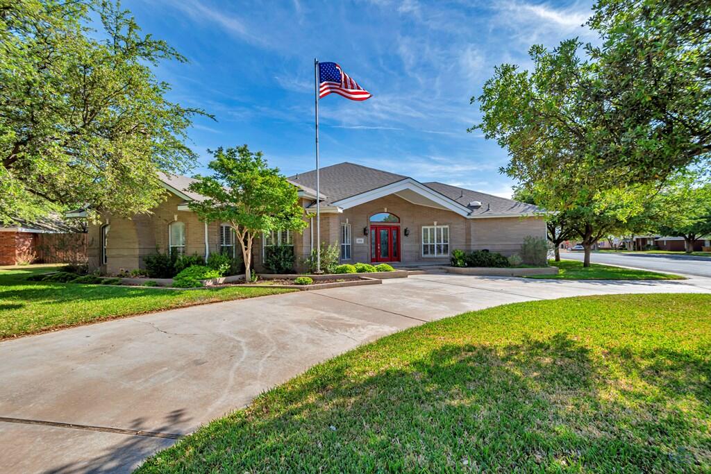 STUNNING GRASSLAND ESTATES HOME SITTING ON OVER HALF AN ACRE PERFECTLY SITUATED NEXT TO CLUBHOUSE, SCHOOL & PARK. GREAT USE OF SPACE WITH A CHEF'S KITCHEN, DESK & BUILT INS, OPEN DINING, GORGEOUS PREMIUM ARTISAN HANDCARVED WOOD FLOORING, PLANTATION SHUTTERS, A DEDICATED OFFICE, A SUNROOM, AND SEQ. MASTER WITH SPA LIKE BATH & COZY FIREPLACE. 2 MASSIVE LIVING AREAS/ 1 WITH FIREPLACE AND SHELVES AS WELL AS A  & FORMAL DINING/FLEXROOM. GENEROUS SIDE PARKING IN THE 3 CAR INSULATED GARAGE WITH PARKING PAD, A 50 AMP RV PLUG, GUTTERS, &  BEAUTIFUL LANDSCAPING ALL ON A CIRCLE DRIVE. WELCOME HOME!!