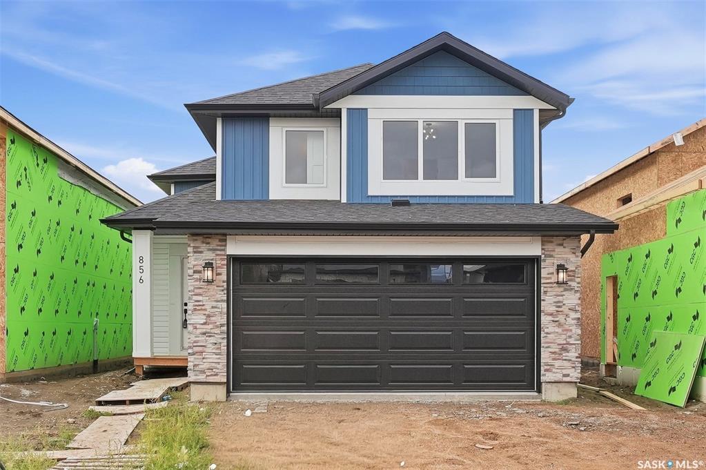 Great location with this Beautiful newly built house that is situated in the popular Kensington area of Saskatoon! Kensington has parks, walking paths, schools & close proximity to many amenities. This stunning newly built home is a 1251 sq. ft modified Bi-level with a double attached 23x20 garage and a finished 2-bedroom legal basement suite. The house boasts exceptional craftsmanship and attention to detail for anyone looking for a luxurious and comfortable living space. The main floor features upgraded 6.5mm vinyl plank flooring, it has a large foyer, open concept kitchen to dining/living area, a 4-piece bathroom, 2 good sized bedrooms and access to the garage as well as the utility room with plenty of storage. The 2nd floor of the home has a large primary bedroom that features a walk-in closet and a 3-piece ensuite bathroom. The basement has separate entry into a legal 2-bedroom basement suite. It features 2 bedrooms, a 4-piece bathroom, laundry, kitchen, living and dining area. There is the possibility to qualify for the Sask. Secondary Suite Incentive (SSI) Grant Program where the ministry of finance provides 35% of the total price to construct a new secondary suite at an owner’s primary residence, to a maximum grant of $35,000 per qualifying property. There will be a concrete driveway & front landscaping that has sod on one side with a tree and mulch on the other side included. Saskatchewan New Home Warranty is included. GST/PST is included in the purchase price with the rebate to the builder. Appliances are included. Do not wait! Call to view!