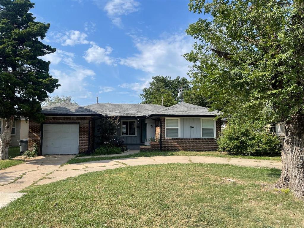 Updated home with wood floors, newer windows, new roof, French doors to private back yard. Newly remodeled kitchen with new dishwasher, stove, oven, quartz countertops, new LVT flooring in kitchen and bathroom. Blinds in all rooms, Circle drive. Covered front porch,  washer, dryer, refrigerator. Inside utility with pantry area. Large garage.  Sidewalk neighborhood, 1/2 block to park, police and Village fire. 
Convenient to shopping, schools, health facilities and major highways. Enjoy this beautiful home in the desirable Village area.