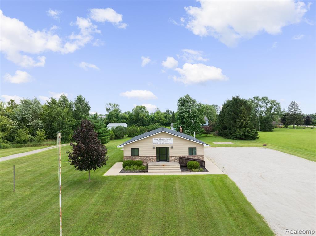 **Rare Opportunity: Beautifully Remodeled Church on 2.6 Acres in South Lyon**
Welcome to 52909 10 Mile—a unique opportunity to own a recently remodeled church on 2.6 acres of land with prime visibility on 10 Mile in South Lyon. This well-maintained property was home to a thriving congregation that outgrew its current facility, making it the perfect space for a new church or a variety of other businesses seeking an exceptional location.
The main sanctuary features updated recessed lighting, ample space for an altar, and numerous pews to accommodate your congregation or audience. The lower level offers a versatile layout, including a nursery, a spacious room ideal for small groups or gatherings, and several additional rooms perfect for meetings or classrooms.
Also included on the property is a home with a life estate. Please contact the listing agent for full details regarding the life estate arrangement.
Don’t miss this rare chance to secure a versatile property with outstanding potential and high visibility. Whether you’re looking to establish a new place of worship or explore other business opportunities, this property is ready to welcome your vision.
**Contact Susan M. Weis today for more information or to schedule a private tour!**