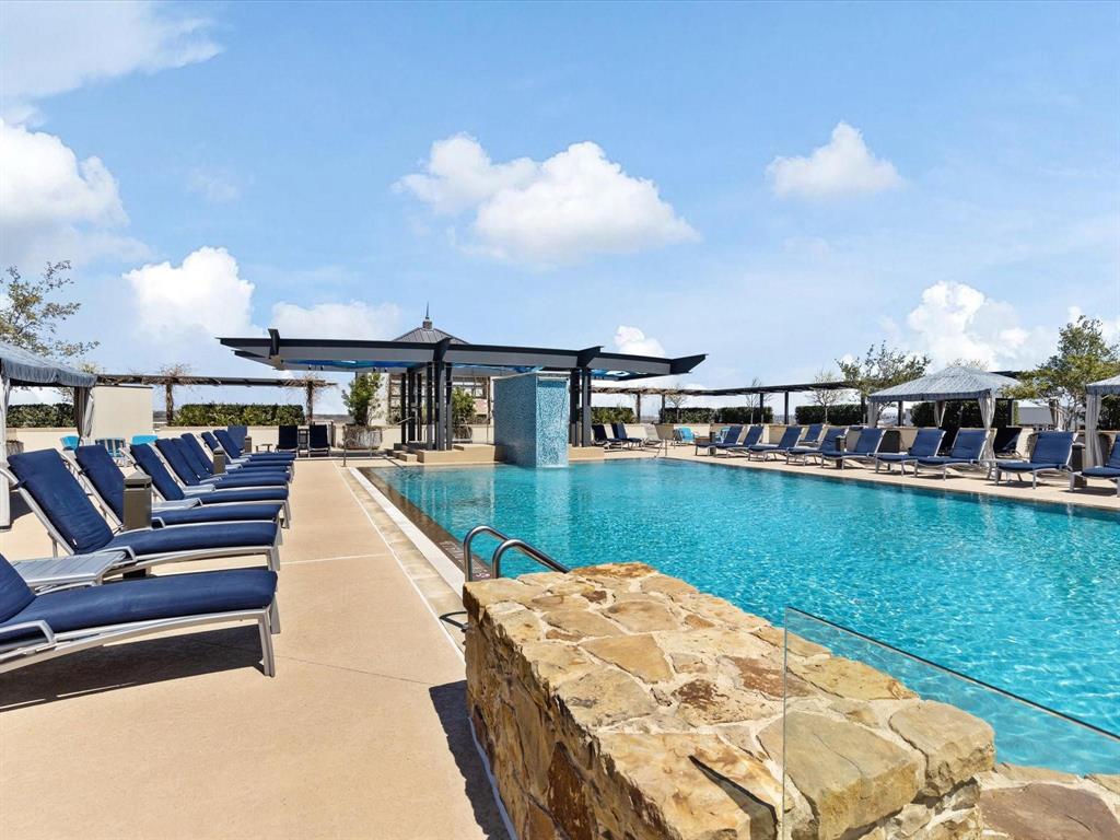 Perched on the 5th floor of the iconic Montgomery Plaza, this beautifully appointed two-bedroom, two-bath residence offers sophisticated urban living in the heart of Fort Worth’s vibrant West 7th Street district. The thoughtfully designed floor plan features an open-concept living and dining area that flows seamlessly from the kitchen, creating an ideal space for both everyday living and entertaining. The primary suite provides a peaceful retreat with a spa-inspired bath featuring dual vanities, a soaking tub, separate shower, and a spacious walk-in closet. A well-sized secondary bedroom with its own ensuite bath offers privacy and flexibility for guests or a home office. Residents enjoy Montgomery Plaza’s exceptional resort-style amenities including a rooftop pool and lounge areas, putting green, private theatre room, state-of-the-art fitness center, and 24-hour concierge service. Located just steps from Fort Worth’s premier dining, shopping, and entertainment, this residence delivers the perfect blend of luxury, convenience, and vibrant city living. There are two parking spaces #2261 & 2262 located in the East Tower. No Pets. Washer, Dryer, and Fridge included with lease.