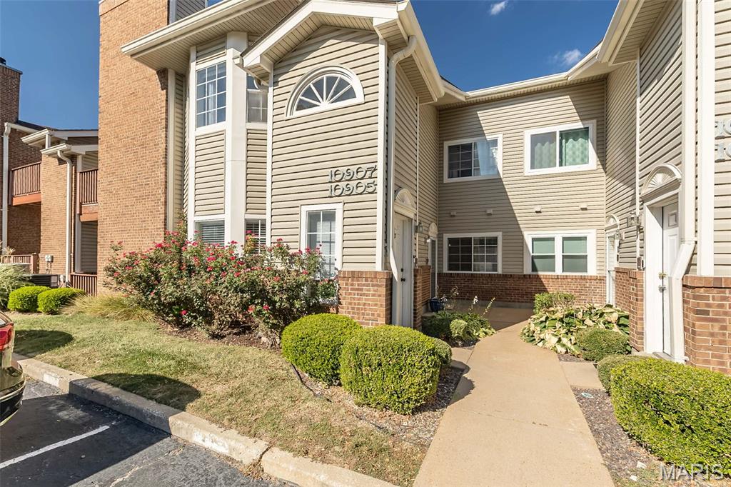 Welcome to this move-in-ready ground-floor 2-bedroom, 2-bath condo in the heart of Creve Coeur, located within the highly sought-after Ladue School District. This inviting home features a spacious open floor plan ideal for both everyday living and entertaining. The freshly painted living room is anchored by a cozy wood-burning fireplace, creating a warm and welcoming atmosphere. The generously sized bedrooms each offer walk-in closets, providing exceptional storage space. The primary suite features classic French doors that open to a private covered patio, perfect for enjoying your morning coffee or relaxing outdoors. Both bathrooms have been tastefully updated, and the convenient in-unit laundry room located just off the kitchen adds to the home's functionality. Enjoy the privacy of your own private walkway entrance, along with the convenience of one assigned parking space. Beyond the condo itself, residents enjoy outstanding community amenities, including a swimming pool, tennis courts, and clubhouse. This combination of features is rarely found at such an attractive price point in the Ladue School District. Set within a stable, well-maintained, and walkable community, this condo offers easy access to shopping, dining, parks, Creve Coeur Lake and major highways. A wonderful opportunity to enjoy comfort, convenience, and an exceptional location in one of the area's most desirable communities.