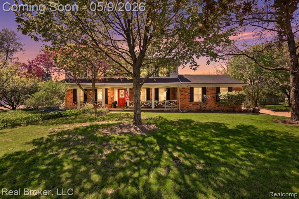 Picture Thanksgiving here. Or a summer evening on the back deck, grill going, kids in the yard.Set on nearly half an acre with mature trees and a covered front porch, this colonial gives you the space to host parties with the privacy to enjoy them.Inside, you’ll find charming character through wood beam ceilings, brick flooring, and a cozy gas fireplace. Fresh carpet installed in 2024 runs through all four bedrooms, the living room, family room, and stairs. No hauling laundry baskets to the basement — first-floor laundry is right where you need it.For families who value community, Michigan’s largest splash pad, the renowned West Bloomfield Library, and a new recreation center completing in 2027 are all within walking distance.