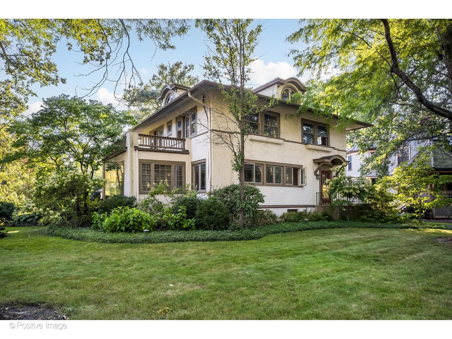 Rare opportunity to complete a comprehensive renovation of a stately Prairie-influenced residence on a prominent corner lot along one of Kenilworth's most picturesque, tree-lined streets. The home's interior has been substantially gutted, including the removal of most interior walls, the kitchen and finished bathrooms. The property is not currently habitable and is ready for the next owner to transform it into an extraordinary custom residence. The substantial four-level footprint provides tremendous flexibility and the potential to create five to seven bedrooms. The main level offers abundant space for a mudroom, den, office, expansive living room, and an open kitchen and dining area. Multiple rooms open to more than 600 square feet of raised patio space overlooking the sprawling side yard, an exceptional setting for entertaining and indoor-outdoor living. The second level has the scale to accommodate a luxurious primary suite with a sitting room, fireplace, private laundry and multiple walk-in closets, along with three additional bedrooms. Two rooms have access to a beautiful terrace overlooking the grounds. The upper level provides additional flexibility for a bedroom, office, studio, playroom or guest retreat. The spacious lower level offers high ceilings and the potential for a recreation room, fitness studio, laundry area, storage and an additional bedroom suite. Many of the home's most valuable architectural elements have been preserved, including original leaded-glass windows and much of the salvageable hardwood flooring. These timeless details provide a beautiful foundation for blending the home's historic character with a completely new, customized interior. A private side driveway leads to a newer three-plus-car garage with four access bays. The expansive bonus level above the garage offers additional potential for an office, art studio, playroom or guest quarters. With its distinctive architecture, substantial footprint, preserved original details and remarkable corner lot, 304 Cumnor Road presents a singular opportunity to create a dream home in the heart of Kenilworth just blocks from Joseph Sears School, New Trier High School, the beach and the Metra train. Please note: The property also has access to a secondary driveway along the right side of the home that is shared with the neighboring property.
