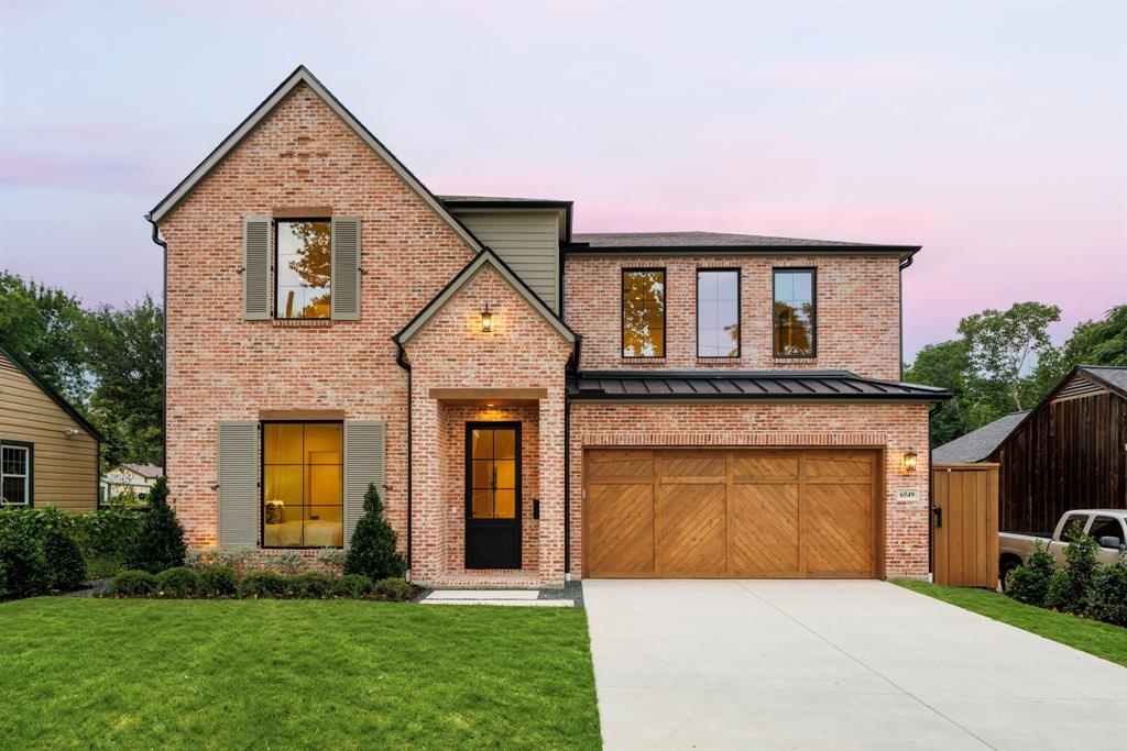 Perfectly positioned within walking distance of Lakewood’s premier amenities,this breathtaking transitional home offers unmatched access to the SoPac Trail,White Rock Lake,& Ridgewood Park - a dream location for outdoor enthusiasts.Expertly crafted by Fairmont Homes,this residence sits on an oversized 55x170 lot surrounded by high-end new construction,blending timeless elegance with modern comfort.The exterior boasts natural brick detailing & charming shutters that lends an established, enduring presence.Inside, luxurious designer finishes abound - from white oak hardwood floors & smooth-finish walls to elevated lighting & rare quartzite & marble surfaces.The heart of the home is the stunning kitchen,featuring a double island, integrated panel-front JennAir Professional appliances (including a 48-inch range),white oak cabinetry,& a spacious walk-in working pantry - a true showstopper.Thoughtfully designed with an open-concept layout,the kitchen seamlessly flows into the dining & family rooms,all overlooking the resort-style backyard.Step outside to a covered loggia with an outdoor kitchen,a sparkling pool,& a large turf yard — ideal for year-round enjoyment.Don’t miss the striking wet bar just off the living room.The main level also features a private guest suite,a stylish powder bath with plaster-finished walls,& a functional mudroom.Upstairs,the luxurious primary suite offers vaulted ceilings with views of the backyard and pool,a spa-inspired bath,& a generous walk-in closet.Each secondary bedroom includes its own en-suite bath & walk-in closet,complemented by a large game room & a beautiful study for work or quiet retreat.Additional highlights include an oversized two-car garage pre-wired for an EV charger and energy-efficient upgrades for year-round comfort and sustainability.This is the sixth of seven custom homes by Fairmont Homes on this coveted block - and the only completed home still available, making this a rare opportunity you won’t want to miss.