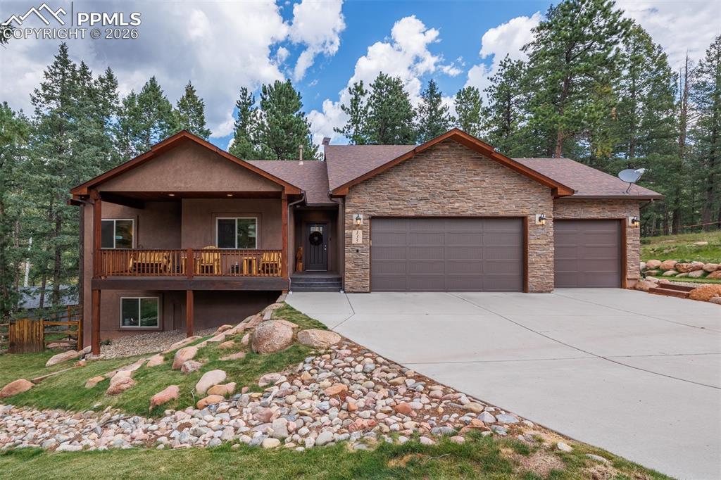 This beautiful, like-new raised rancher offers nearly 3,000 sq ft of living space on just over a half-acre in a quiet and private cul-de-sac setting.  With 5 bedrooms, 3 bathrooms, a 3-car oversized garage and a fully finished walk out basement, this home offers instant livability and enjoyment.  Upon entry, step onto hardwood floors leading to the great room that adjoins an open concept kitchen with ample granite countertops, beautiful hickory cabinetry, an oversized pantry and a custom bar area.  Only steps away from the great room is your primary suite featuring a double headed walk-in-shower, dual vanity sinks and walk-in closet.  Main level living features two additional bedrooms and a full bath.  Step down into the walk out basement featuring a spacious family room, two bedrooms and a full bath.  An oversized 3 car fully finished and insulated garage offers plenty of room for vehicles, storage, or a workshop.  This home features 4 outdoor spaces with two covered patio areas for your entertaining needs.  A convenience fence is on the property (does not include the entire back yard) enabling turnkey safety for kids and/or pets.  An additional side yard is the ideal location for multiple grills and a gardening area featuring a newer Planta Greenhouse. The home is surrounded by mature trees; it provides the perfect blend of privacy, comfort and convenience.  With its desirable floor plan, quality finishes, and tranquil setting, this property is a rare find and move-in ready for its next owner. A natural gas backup whole house generator is included. ILC is available in the supplements.