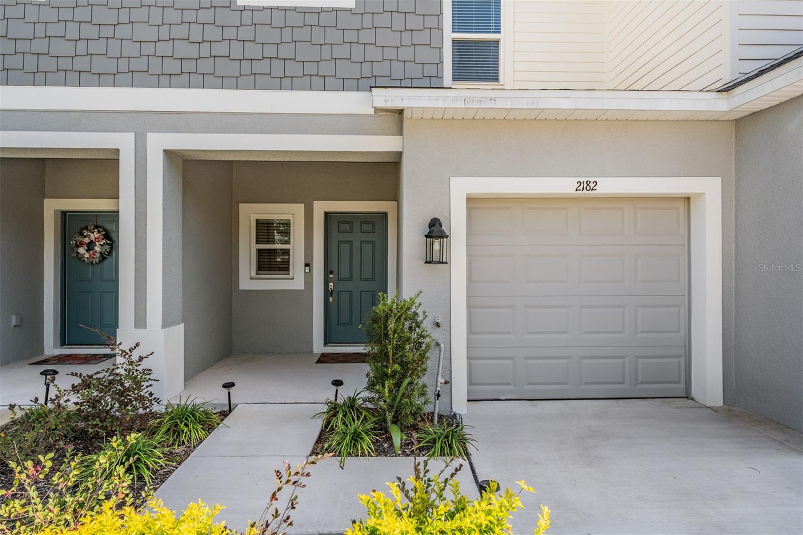 WELCOME HOME! Discover your nearly brand new townhome at River Landing, located on 700 acres along the new SR 56 extension. River Landing is the perfect combo of small town charm and easy access to the big city. This community has a pool, cabana, sports field, and a dog park. Featuring 3 bedrooms and 2.5 bathrooms, it's a spacious floorpan, with chef style kitchen and a large back patio overlooking the pond.Enter the home from the cute front porch and directly into the heart of the family room and the open concept kitchen that is equipped with an extra large island. Sharing the first floor space is a half bath, 1 car garage, and a large outdoor patio with no rear neighbors.Upstairs, there are 2 bedrooms with one full bath in addition to the spacious owners retreat with a walk-in-closet and double sink vanity bathroom. The laundry area is also upstairs for added convenience. Can't beat this location with close proximity to I-75 and Bruce B. Downs. River Landing provides a central location with convenient access to Wiregrass Mall, Tampa Premium Outlets, highly rated healthcare facilities and professional sporting events! Call today for your private showing!