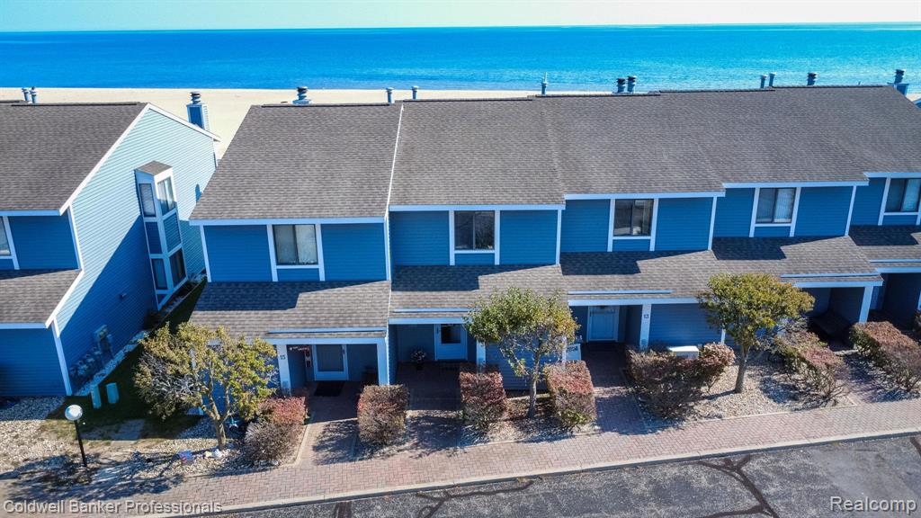 Discover an exceptional year end opportunity with this Lakefront Condo on Lake Huron! This charming two-story residence features two spacious second-floor bedroom suites, each with its own ensuite bathroom. Enjoy the outdoors with two inviting spaces: a sun deck and a covered patio, perfect for savoring stunning morning sunrises. With over 700 feet of private sandy beach at your doorstep, you can bask in the sun, play in the water, and unwind under the stars in the evenings. The first floor boasts a generous open living room that flows seamlessly into a well-equipped kitchen featuring stainless steel appliances. A convenient half bath for guests and a separate laundry room off the kitchen add to the home’s functionality. Ideally located, you can easily walk to town for shopping, dining. This condo offers the perfect blend of relaxation and convenience to meet all your needs. Oscoda’s best kept secret!