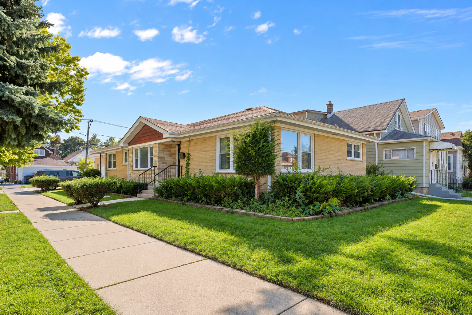 **One-of-a-Kind Extra-Large Raised Ranch in Prime Portage Park!** Located on a beautiful tree-lined street, this impressive 6-bedroom, 4-bath raised ranch sits on an oversized 45' x 125' corner lot and offers exceptional space, flexibility, and functionality. Completely updated in 2014, the home features a thoughtfully designed main level with 3 bedrooms, 2 full bathrooms, and beautiful hardwood flooring throughout. The spacious primary bedroom includes a large private bathroom. A bright and expansive living room offers abundant natural light, creating a warm and inviting atmosphere. The well-appointed kitchen provides generous cabinet space, granite countertops, and a full suite of stainless-steel appliances, including a refrigerator, range, exhaust hood, and dishwasher. The main level also provides direct access to the extra-large 2.5-car attached garage, offering excellent storage and convenience.  The fully finished basement adds even more living space, featuring 3 additional bedrooms and 2 full bathrooms, including a private suite. A second kitchen and spacious entertainment area make the lower level ideal for extended family, guests, or an in-law arrangement. A large laundry room completes the basement.  Additional features include central heating and cooling and a security system covering the entire house, providing year-round comfort and added peace of mind. Conveniently located near shopping, dining, transportation, schools, parks, and other neighborhood amenities.  Don't miss this rare opportunity-schedule your private showing today!