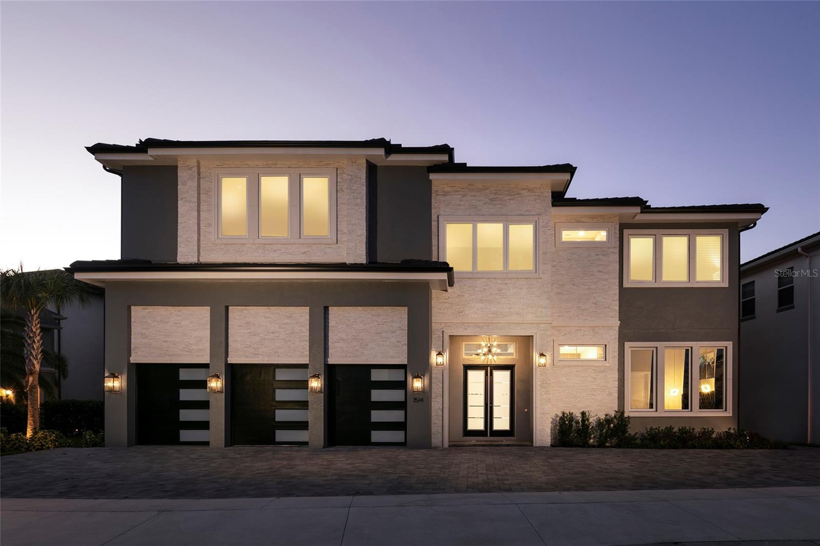 Enjoy Luxury at its Finest! Welcome to The Modern Jewel at Reunion an AMAZING 7450 sq. ft. modern custom build featuring 10 bedrooms, 9 full bathrooms and 2 half baths accommodating up to 22 Guests! You will immediately notice the home has been outfitted with exquisite high end finishes and fixtures throughout the entire home. The first floor features three primary bedrooms featuring king size beds with each having their own en suite bathroom. Hours of enjoyment await in the first floor game room consisting of a half court basketball, arcade games and skeeball. As you proceed into the expansive living area you find plenty of space to unwind and relax from the days activities. The living area also has a convenient wet bar and beverage cooler to quench your thirst. The Island kitchen is a Chef's dream as it is fully equipped with professional grade stainless appliances that include gas range, dual refrigerators, dual dishwashers, convection oven and much more. Enjoy a hearty breakfast at the central island. The formal dining area is adjacent to the kitchen, perfect to socialize with the chef while preparing meals and enjoy incredible views for your pool deck and it will accommodate seating for 12 guests! Step onto the SPECTACULAR private pool deck featuring a custom 30 ft. pool that includes a spillover spa, sun shelf and integrated deck jets overlooking the signature palmer golf course with fantastic GOLF VIEWS of multiple holes and the Reunion Grande. The covered lanai is equipped with SONOS bluetooth surround sound, and a summer kitchen. Upstairs discover an amazing large game room that includes a 8ft. slate pool table, air hockey, foosball, multi arcade game, (4) Flat screen TV's, wet bar with beverage cooler, XBOX and a JUMBOTRON! Additional access to a balcony overlooking the pool deck and golf course. Ready for some popcorn? Adjacent to the game room is a state of the art theatre room with comfortable seating for 16 guests. There are (3) custom themed bedrooms that are all connected by slides that will have them landing in a different adventure every time and one bedroom includes a Playstation 4 and XBOX! The spacious four remaining guest bedrooms are tastefully decorated and en suite as an added bonus. Reunion Resort is a one of a kind 2300 acre Resort and Golf community that has many amenities including a water park complete with water slides, lazy river, zero entry pools & food and beverage service, 3 award-winning golf courses designed by the legends of golf (Palmer, Watson & Nicklaus), 11 pools throughout the community, mini putt putt golf, world class tennis courts, pickleball courts, playgrounds, dog parks, golf cart & bike rentals and several on-site restaurants to include fine dining. Reunion Resort is located just 6 miles to Disney and the parks, and a short drive to the Orlando International Airport. ACTIVE TRANSFERABLE MEMBERSHIP for the next owner. Future rental income and bookings can convey.