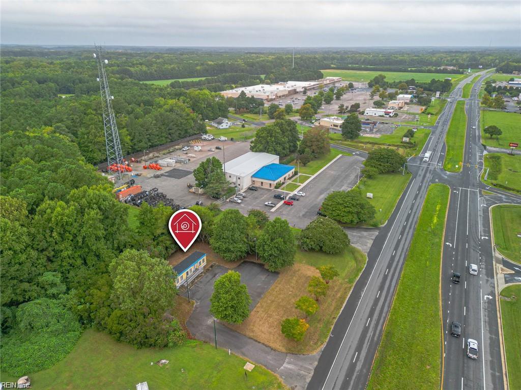 Great location for a small business in Exmore near the shopping centers! Use the existing trailer or build to suit on this half acre parcel off of Lankford Highway with visibility both north and southbound at a traffic light. The existing structure offers a private office, bathroom, and large reception area or co-working space.