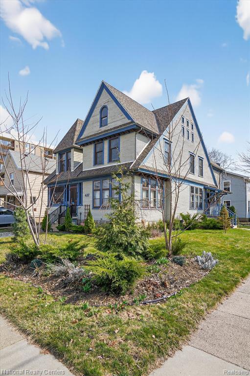Welcome home to this amazing, one of a kind Historic, Lansing beauty!  Located in the Central business district, within walking distance of The Lansing Center, Jackson Field, and the Michigan State Capitol. You can catch an actual view of the state capitol building from the second floor balcony.  To call this "a cool house" is an understatement. Pictures do no justice to this remarkable residence. It is absolutely a must see!With natural light pouring throughout the expansive living/dining room area, space is abundant yet maintains such a warm & cozy vibe, surrounded by windows & warm lighting. This home offers 4 bedrooms, 2 full baths, hardwood floors, large study with fireplace, built in bookcases, a completely renovated one of a kind designer kitchen, with a gorgeous copper sink, intricate vent hood, coordinating penny tile flooring which is HEATED by the way, lovely window coverings, ceiling height cabinets with a ladder to access, butcher block countertops, a free standing island, with quartzite counter top and storage galore! No space has been left untouched here! In addition, there is a second full size, eat in kitchen, and laundry on the 2nd floor! So much time, effort, meticulous detail, and attention to styling has been put into this amazing abode! From the flooring, to the window treatments, molding, storage etc. The home owner has even gone so far as to locate a vintage arched wooden door with lead glass, from another state, to match perfectly with the home's decor, and installed it to fit seamlessly into what was a completely closed off doorway! There is far too much to this unique haven to mention here. Come and take a look for yourself!This home will not appeal to those who like the cookie cutter designs. This is for those who have a real eye for design, and a flair for the rare and historic! Those who recognize a true gem when they see it! (Remodeled in 2024- New roof installed approximately 4 years ago!)