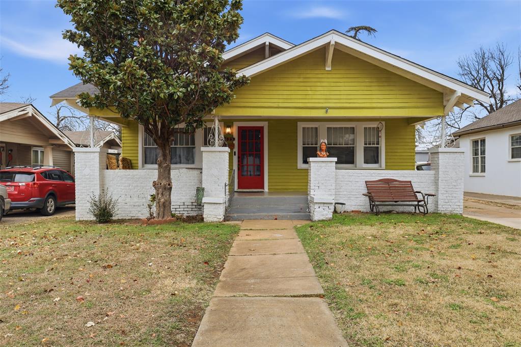 Opportunity to provide TLC in the desirable Military Park neighborhood, within walking distance to OCU and Uptown/23rd Street. This property offers strong value-add potential in a prime, high-demand location. A beautiful large covered front porch shaded by a mature magnolia tree creates a welcoming first impression and classic curb appeal.  The home features original wood floors throughout and retains its historic charm.Major systems have already been addressed, including complete plumbing replacement, fully converted from cast iron to PVC in recent years. The kitchen and bathrooms are beautiful, and the home is all-electric.A standout feature is the cool basement, offering additional usable space—perfect for storage, a workshop, or future creative use. Just off the kitchen is a wood-paneled bonus room full of character, with potential to become a dream pantry, study, craft room, or flex space. Bring your imagination.The property also includes a detached one-car garage with a long driveway, providing valuable off-street parking.