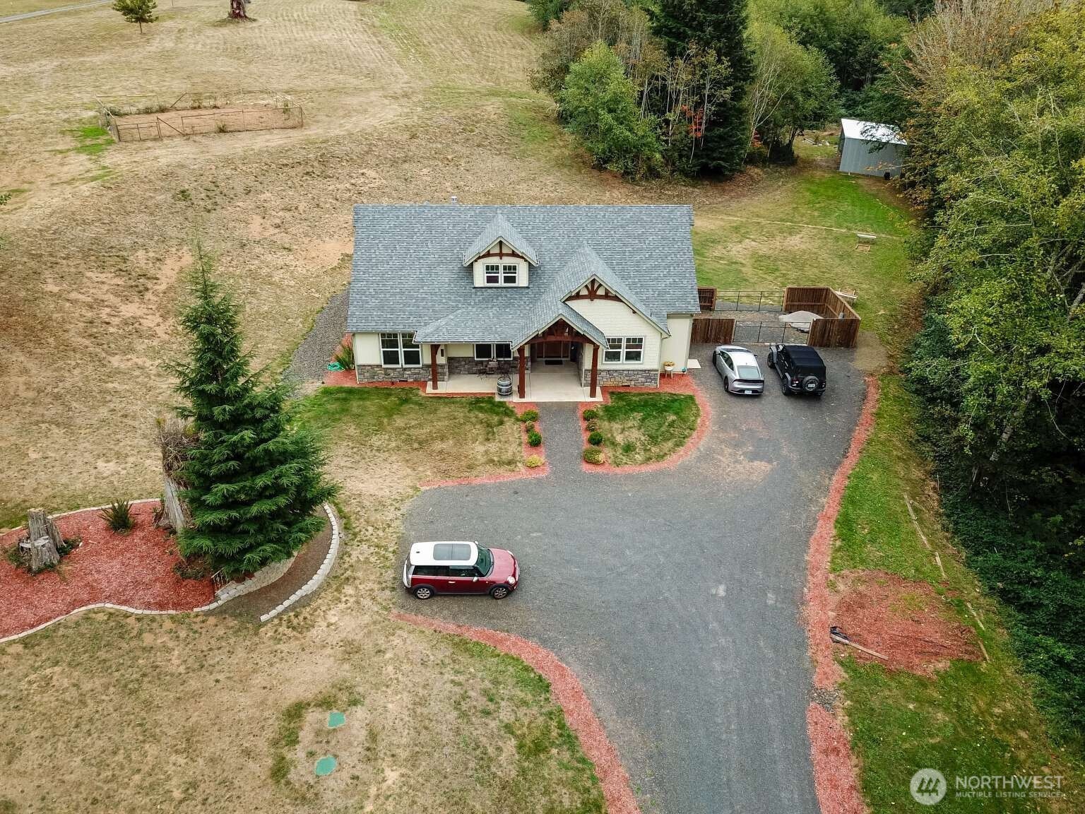 Custom Built 2020 Home on 6.2 Acres with Stream. Secluded 3 Bedroom 2.5 bath. Large Extra / Entertainment Room Upstairs with 1/2 bath. River View. Stunning Entry with Timber and Tongue & Groove. Large Laundry / Mud Room. 2 Propane Fireplaces with Custom Brick and Mantel. Gourmet Kitchen with Large Cook Island including Double Ovens and Commerical Quality Cooktop. Huge Pantry. Custom Granit Countertops, Cabinets and Lighting throughout. Tons of Storage throughout home. Large Covered Back Patio with Custom Timber and Tongue & Groove. Big Peaceful Backyard - Very Private. 24x36 Shop, 20x40 Equipment Building and RV Cover w/Sewer Dump. Fenced Garden Area. Secluded Dead-end Road with Eight Additional Homes. A Dream to come home to