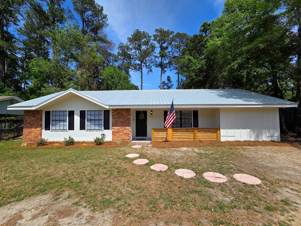Welcome to this beautifully renovated 4 bedroom 3 bath home conveniently located close to YMCA, shopping, restaurants and schools.   Comfortable living space, this property blends modern updates with timeless charm—perfect for families, first-time buyers, or anyone looking to enjoy a peaceful setting with convenient access to everything. Step inside to find a bright floor plan with natural light, spacious living area, and stylish finishes throughout. The kitchen features stainless steel appliances, white cabinetry and a bar for extra seating and serving, making it both functional and inviting—ideal for everyday living and entertaining. The two primary suites provide a relaxing retreat with [en-suite bath and closet,  while the additional bedrooms are generously sized and versatile. Outside, enjoy a private backyard with a deck, perfect for gatherings, pets, or quiet evenings. Don't miss your chance to own this wonderful home in a desirable area. Schedule your private showing today!
