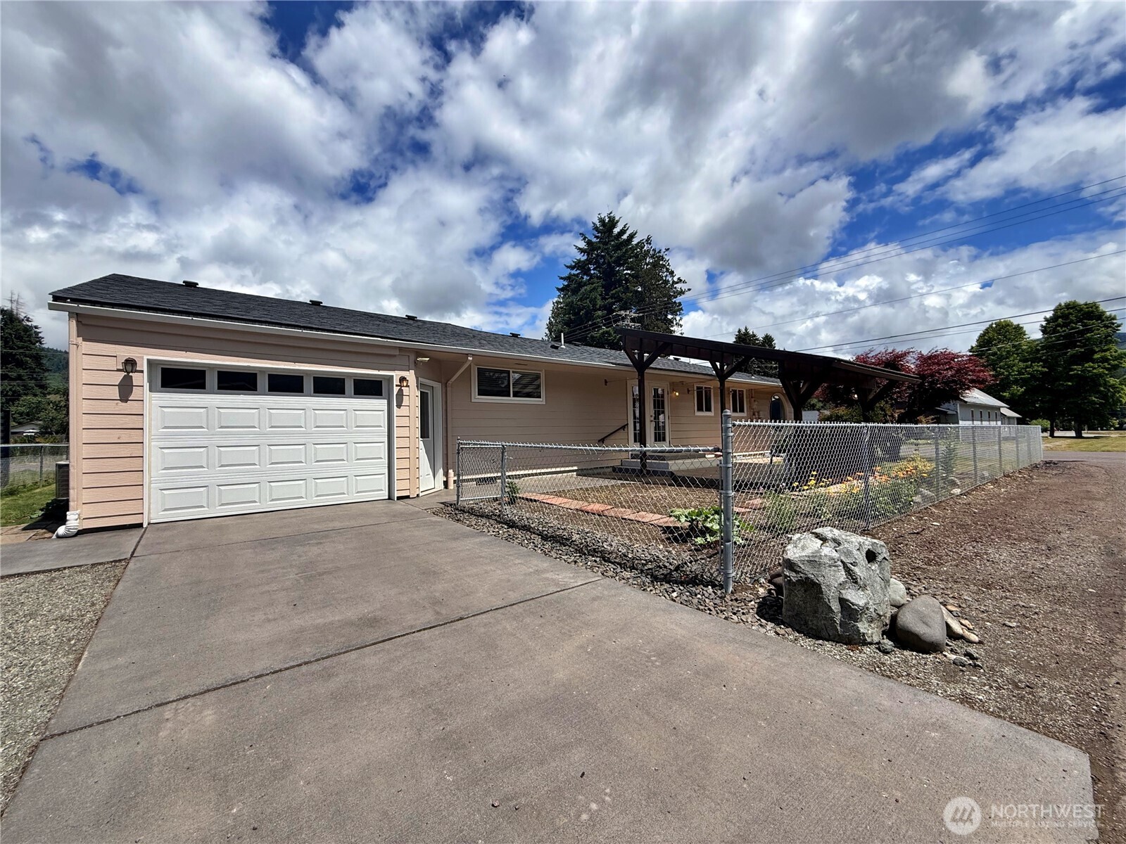 Immaculate home in the heart of Morton. Close to public transportation, shopping and hospital. Perfect for a first home, this home is easy to maintain and set up perfect for minimal yard work. Three bedrooms, one and a half bath with a nice little attached garage. Partially fenced, nice covered patio area with a Peterman Hill view.