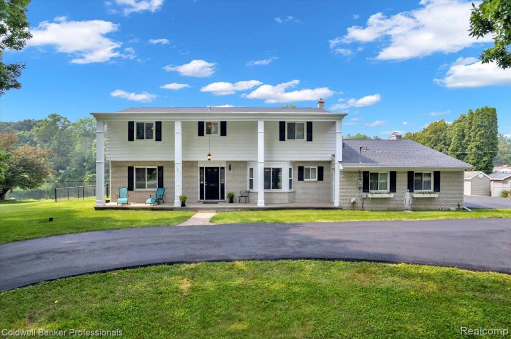 *Check out this Grand 2-story Lakefront Colonial, nestled on a picturesque 1.28-acre lakefront lot in one of Lapeer’s most desirable subdivisions. Enjoy stunning lake views from every window and exceptional living space!*Drive up the freshly asphalted circular drive leading to a heated, side-entry garage. Partially fenced yard features the above ground pool with sundeck and a three-season enclosed patio.*The main floor offers spacious formal and informal living areas, including the living room with french door entry and cozy natural fireplace, and large family room perfect for entertaining, featuring a door wall opening out to the patios. The updated kitchen features custom floor-to-ceiling cabinetry, includes appliances, and a charming breakfast area with peaceful lake views. You’ll also find two newly remodeled half baths and a formal dining room off the foyer.*Upstairs, you’ll find four Very Large bedrooms with hardwood floors, abundant closet space, and two fully renovated bathrooms, including a dual-entry ensuite. Second-floor laundry adds tons of convenience to your daily routine.*The finished basement offers a rec room with pool table, a bonus room, a large storage room, and a separate mechanical area, complete with a drainage system already installed.*Located on the outskirts of the City of Lapeer, you’ll enjoy quick access to major roads, perfect for commuting while still enjoying the peace and privacy of lakeside living.*Other updates include the septic field, roof, windows with transferable warranty, and home mechanicals.*This home truly has it all — space, style, location, and those peaceful lake views. Don’t miss your chance to call it home!