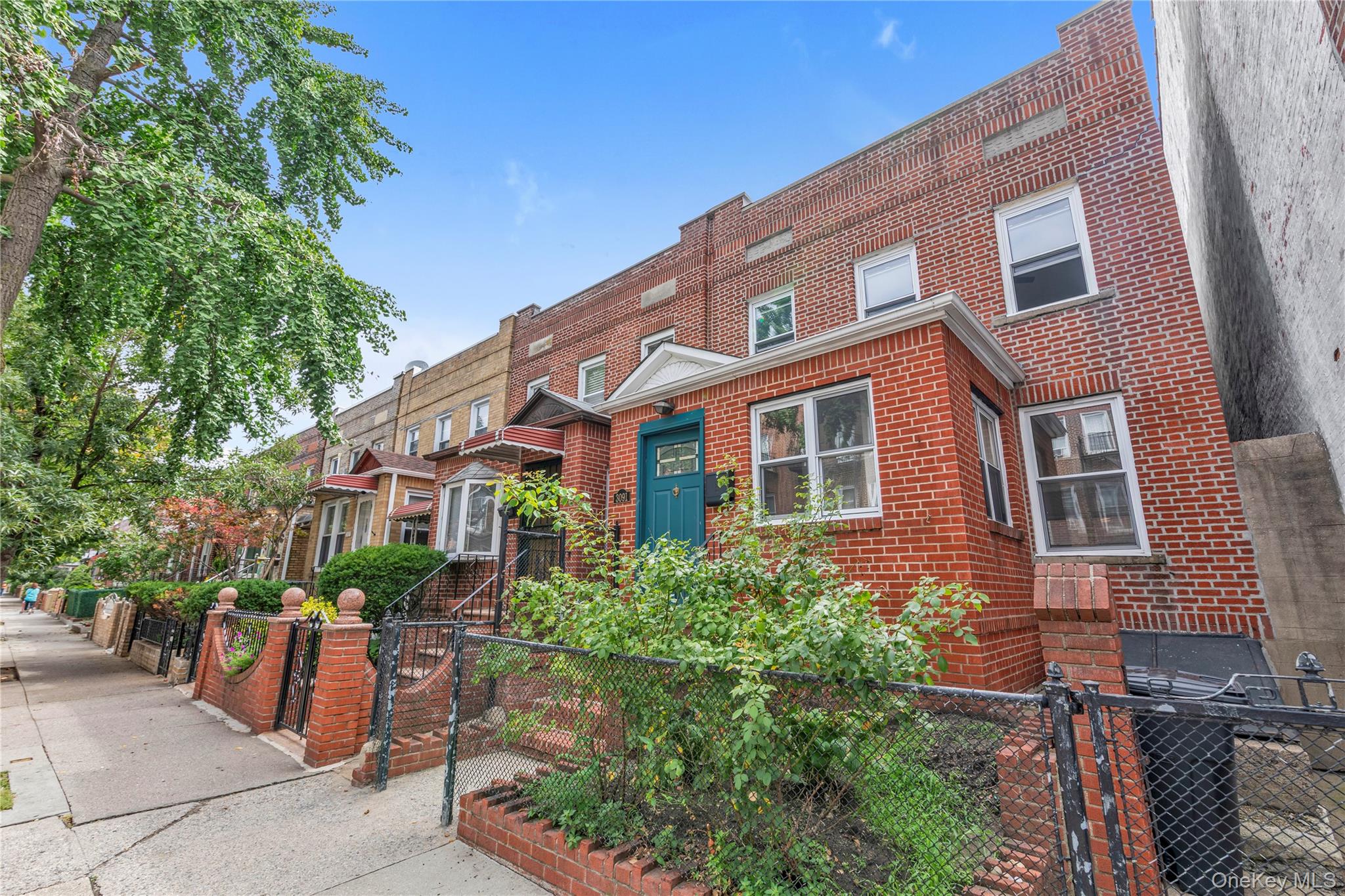 Welcome to this beautifully renovated semi-detached 3-bedroom, 2.5-bathroom one-family home in Astoria, offering modern finishes, generous living space, and wonderful indoor-outdoor living.The inviting entrance foyer features a large custom closet and opens to a spacious first-floor living area with new oak hardwood floors and moldings throughout. The high-end renovated kitchen features Corian countertops, stainless steel appliances, and abundant cabinetry, creating a stylish and functional space for everyday living and entertaining. A convenient half bath completes the first floor.Upstairs, you'll find three bedrooms and a newly renovated full bathroom featuring floor-to-ceiling tile and a relaxing soaking tub. Two of the bedrooms are equipped with modern ceiling fans. Additional updates include all-new windows installed in 2021 and gas heat.The full finished basement offers exceptional flexibility with additional living space, a bathroom with shower, dedicated laundry area as well as abundant storage closets.Outside, enjoy a fenced front yard and a private backyard oasis—perfect for relaxing, entertaining, gardening, or simply enjoying your own outdoor retreat.Move-in ready and thoughtfully renovated, this mint condition Astoria home offers the perfect combination of comfort, style, and private outdoor space. Conveniently located near neighborhood restaurants and cafes, the M/R subway stop, and the many shops and amenities along Steinway Street and Broadway.