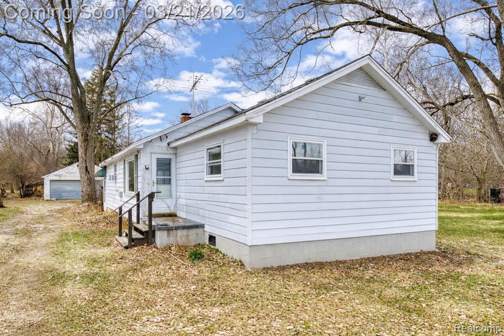 Set on a beautiful 9-acre parcel in Novi, this property offers a rare opportunity to enjoy exceptional land, privacy, and possibilities in a highly desirable location. From the moment you arrive, the setting makes an impression with mature trees, wide open space, and a detached 2-car garage adding functionality and flexibility. Inside, the home features a bright living area, dedicated dining space, and a practical kitchen footprint with easy access to the rear deck and expansive backyard.The main level includes three bedrooms, a centrally located full bath, and a layout that provides a solid starting point for everyday living. An unfinished basement adds valuable storage and additional potential over time. Outside, the property is where this offering truly shines. The depth of the lot, natural surroundings, and usable acreage create an outstanding backdrop for enjoying the outdoors, expanding your vision, or investing in the long-term value of the land itself.Whether appreciated as-is, updated over time, or viewed as a chance to secure a premium piece of property in Novi, this is the kind of setting that rarely becomes available. With over 9 acres, a detached garage, and a location that offers both space and convenience, the possibilities here are what make this property so compelling. come see this prime Novi location with 252 feet of Novi Road frontage. Just south of 10 mile road. Two adjacent lots sold together, totaling 9 acres. One parcel 5 acres the other 4 acres Currently zoned R-4 Existing 1000FT home and detached garage located on the 5 acre parcel.