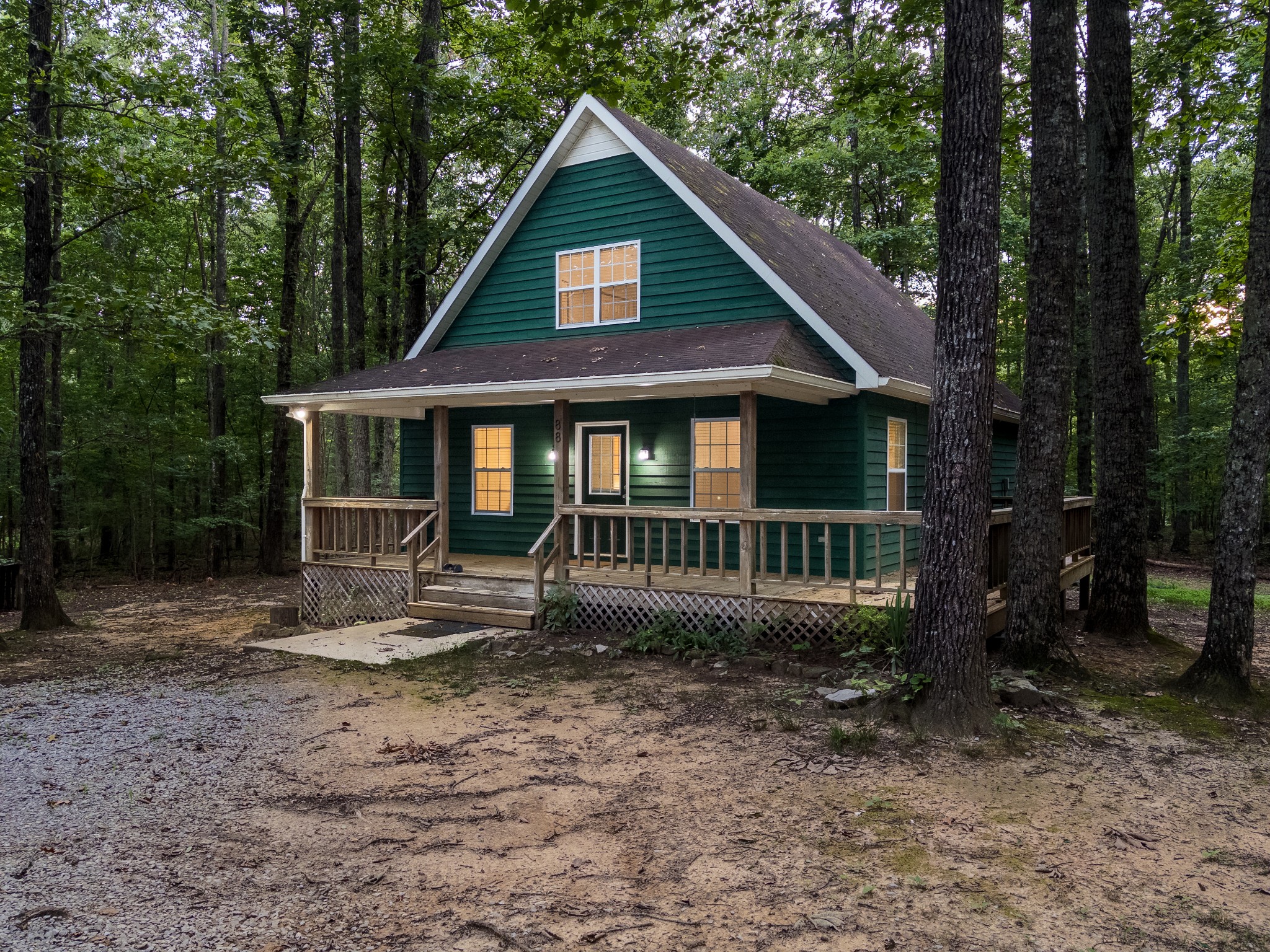 Nestled in the heart of a tranquil hardwood forest, in beautiful Sewanee, TN, this enchanting 4-bedroom, 2-bathroom home offers the perfect blend of rustic charm and modern comfort. Situated on 1.4 acres, this quaint and cozy retreat boasts gorgeous real hardwood floors, fresh paint throughout, and a wraparound porch ideal for soaking in the peaceful surroundings. Step inside to find warm and inviting living spaces, filled with natural light that accentuates the home's timeless appeal. The spacious bedrooms provide a sense of comfort and relaxation, while the open-concept living space, dining area, and kitchen seamlessly flow together. Perfect for gatherings, this spacious and thoughtfully designed layout creates a warm and welcoming atmosphere for entertaining friends and family. Outside, the picturesque landscape enhances the home’s storybook-like ambiance, making it an idyllic escape for those seeking serenity and beauty in nature. Whether enjoying a morning coffee on the porch, exploring the wooded grounds, or simply savoring the charm of this home, it’s a perfect haven for those who appreciate character, charm, and tranquility. Don’t miss this rare opportunity to own a piece of woodland paradise! Contact me today for more information or to schedule a private showing.