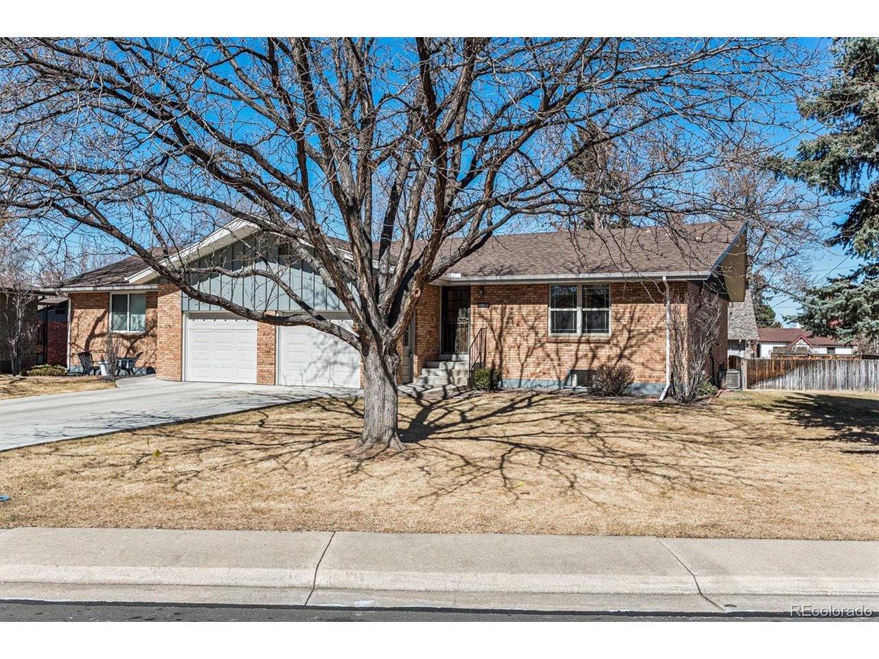 Outstanding value in Wheat Ridge for location, size, and setting! Ideally situated on a corner lot in a quiet cul-de-sac, this home offers privacy, outdoor space, and excellent potential. While the home remains largely in its original condition, it has been refreshed with new interior paint, new carpet, all appliances and updated mechanical systems, providing a solid foundation for future personalization.The bright and functional floor plan supports easy day-to-day living and entertaining. The main living areas connect comfortably to the private fenced yard and deck with sunny exposure, creating great indoor-outdoor flow. There is a spacious attached one car garage with side access door.The home includes three bathrooms and multiple flexible living spaces as well as a cozy fireplace. The basement features an egress window, allowing for additional usable living space, guest accommodations, hobbies, or a home office.Located within a well-managed HOA community, the association provides excellent value by covering roof, insurance, landscaping, trash, water, and exterior maintenance, making ownership simple and low-maintenance. The HOA is solid, stable, and very reasonably priced for the services provided.Enjoy a highly desirable location with easy walkability to Wheat Ridge parks, restaurants, entertainment, and neighborhood amenities, along with convenient access to nearby trails and green spaces.This property presents a rare opportunity to own a well-located home with great bones, outdoor space, and room to make it your own.