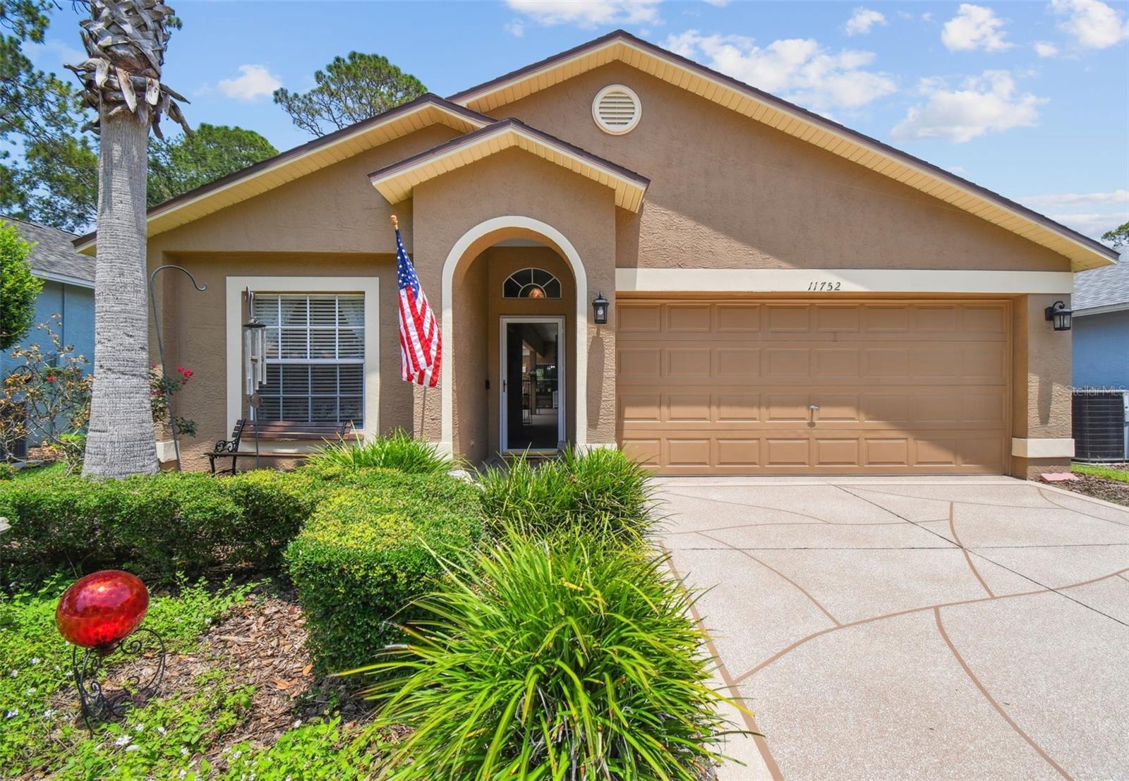 Unique Floor Plan with In-Law Suite separate (Bedroom and Full Bath) from Main House.  Enter into Covered Enclosed with Partial Overhead Screening to the Private Courtyard with a Inground Heated Spa making this your own piece of Paradise!  Features Include: Large Great Room/Living/Dining Room with Triple Sliders to the Courtyard that Slide away into Wall; Spacious Newly Remodeled Kitchen with New Soft Close Cabinets and Abundant Quartz Counters/Pantries/Center Island/New Kitchenaid Appliances; Laundry Room Plus small Room that could be either a Hobby/Office/Study room; Guest Room and Full Bath; Master Suite with Room-size Walk-in Closet; Ensuite Bath with Dual Sinks/Roll-in Snail Shower/Walk-in Closet; Whole House Central Vacuum; Attached 2 Car Garage with Extra Storage.  Located in "Maintained"  Village.  Heritage Pines offers Amenities Activities for ALL Interests and is conviently located to the Tampa Area and the Nature Coast.  Roof - 2020  A/C - 2020