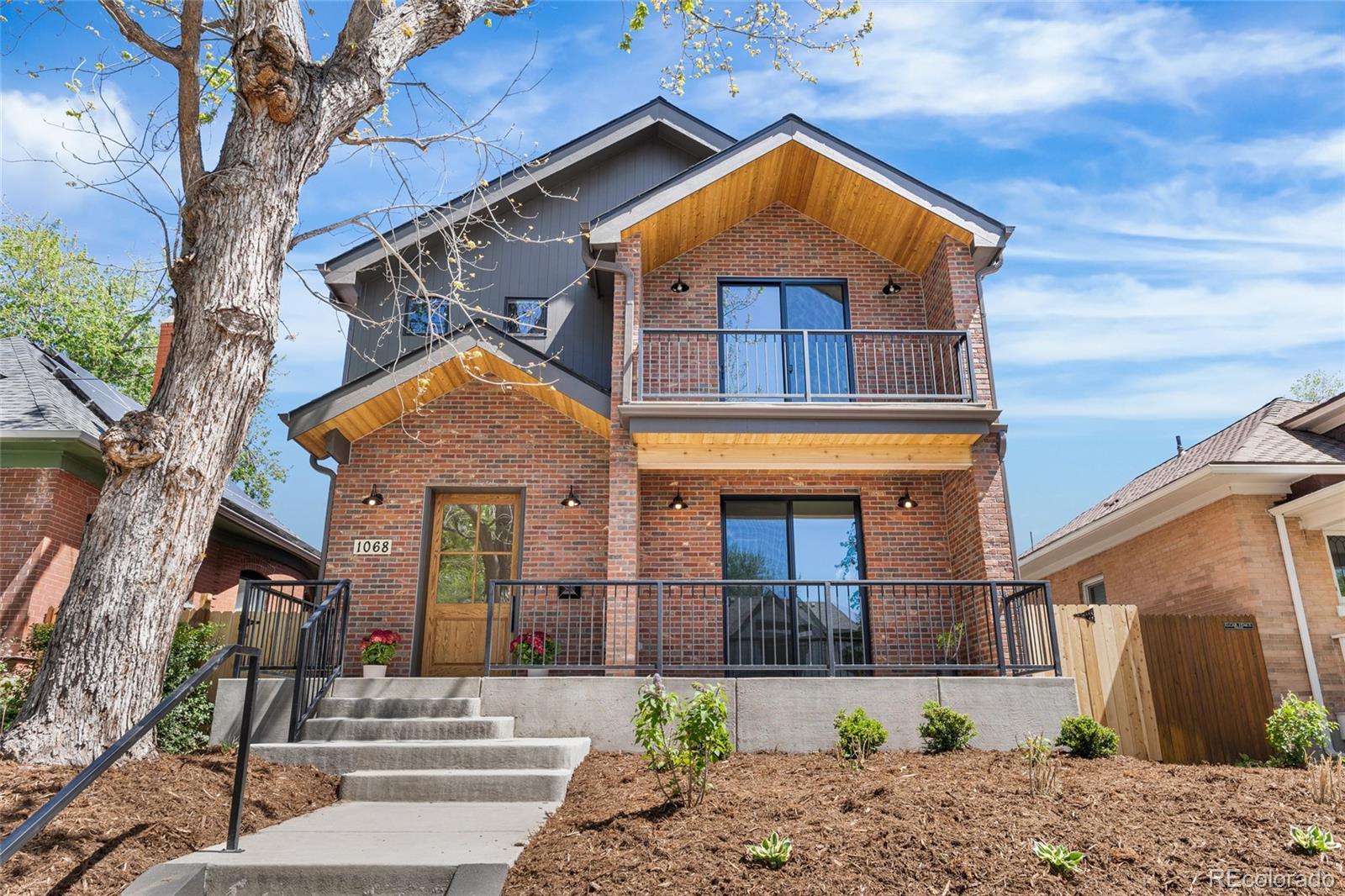 Not all homes are created equal, and this one truly stands out from the rest. Just one block off Washington Park, this beautifully designed pop-top lives like a brand new build, perched up high on the lot offering incredible views in every direction - mountain views from the front and peaceful park and lake views from the back.Inside, you’ll find an open layout designed for both everyday living and entertaining, anchored by engineered white oak hardwood floors that bring warmth and a modern, elevated feel throughout. The kitchen is a true showpiece, featuring Taj Mahal quartzite waterfall countertops, custom oak cabinetry, and a color-drenched thoughtfully designed butler’s pantry that adds both function and style.With 5 bedrooms and 5 bathrooms, the home offers flexibility for guests, work-from-home setups, or additional living space, all while maintaining a seamless and cohesive design throughout.Step outside to a private, fenced-in yard, perfect for relaxing or hosting, along with the convenience of a new 2-car garage.Situated in one of Denver’s most sought-after locations, just steps from Washington Park, this home offers the rare combination of new construction feel, thoughtful design, and unbeatable access to the best of the neighborhood.