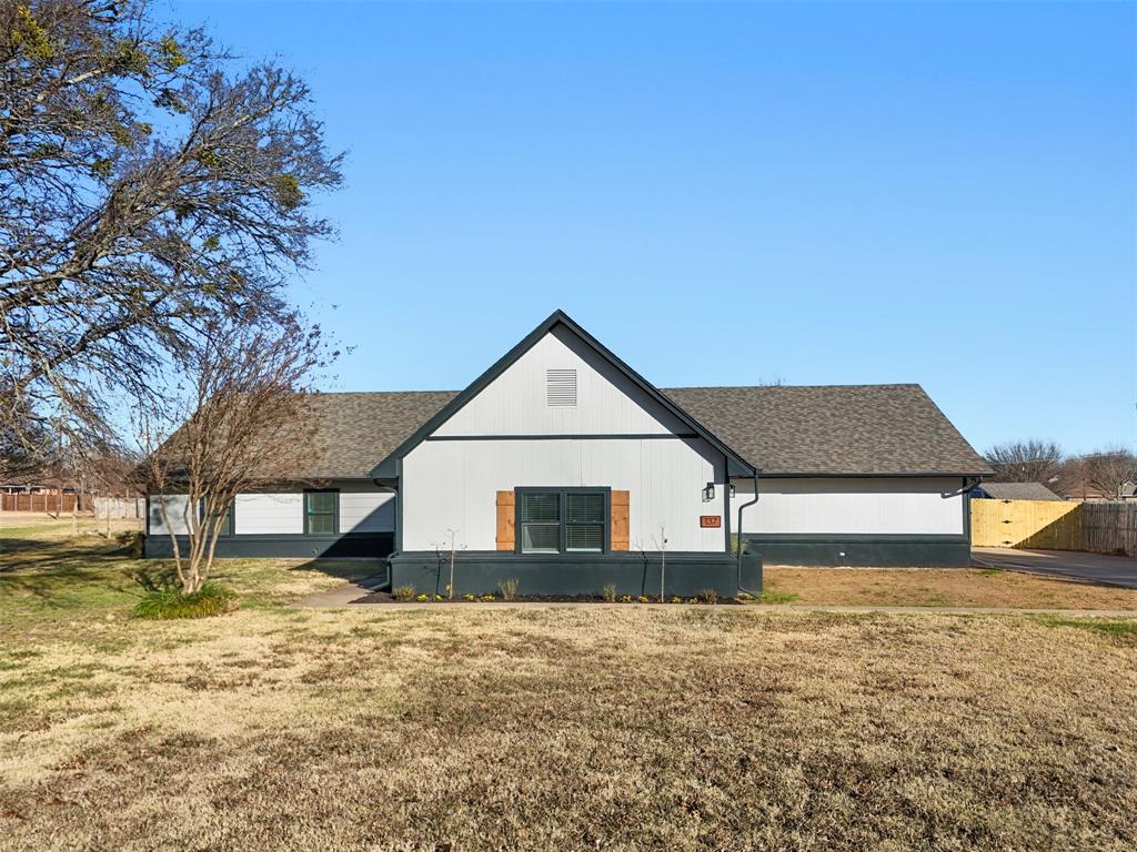 Welcome to 137 S Meadowbrook Drive in Pottsboro, a recently remodeled ranch-style home that puts you just minutes from the fun and freedom of Lake Texoma. This spacious property sits on nearly an acre and offers a flexible setup with 4 bedrooms in the main home, plus a detached private quarters complete with its own half bathroom—perfect for guests, in-laws, a home office, gym, or lake-weekend overflow. Inside, you’ll love the fresh updates including luxury vinyl plank flooring, quartz countertops, an open-concept layout, and plenty of natural light. The generous living spaces make hosting easy, whether it’s family dinners, game nights, or friends rolling in after a day on the lake. Step outside and enjoy wide-open yard space with room for boats, trailers, fire pits, pets, and North Texas living at its best. Located in Pottsboro ISD and close to marinas, fishing, and outdoor recreation, this home is ideal for full-time living, weekend escapes, or investment potential near Lake Texoma.