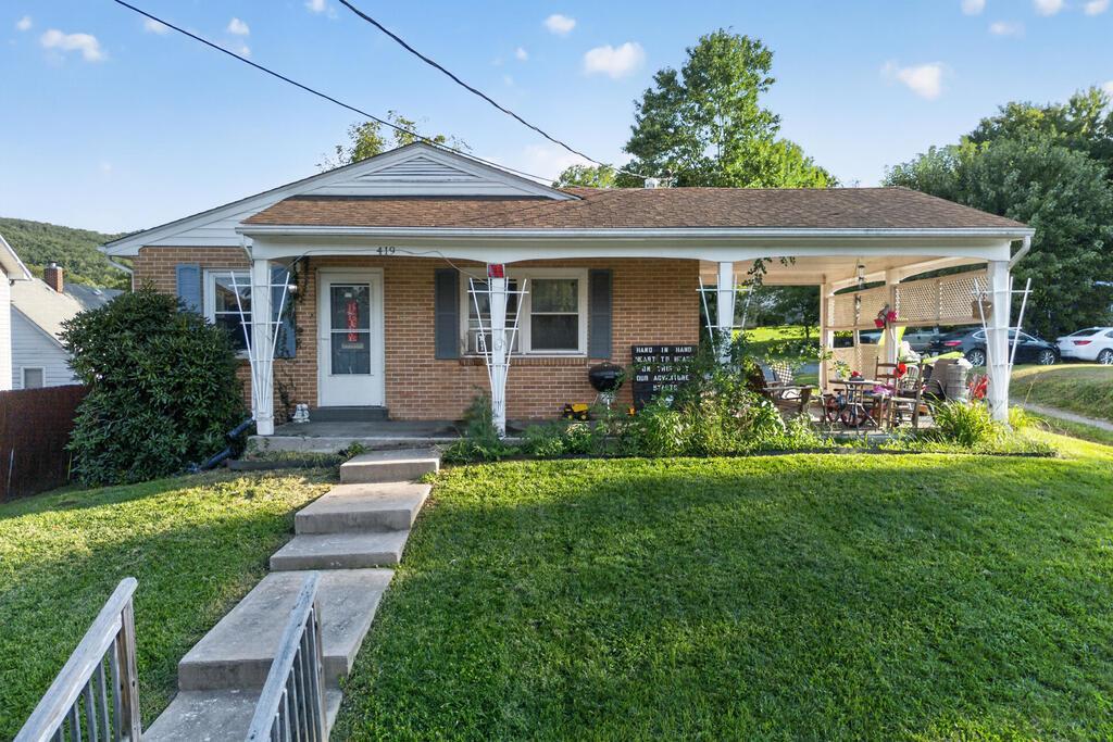 Welcome home to this charming 3-bedroom, 2-bath home conveniently located in a friendly small-town setting! Offering a comfortable and functional floor plan, this home provides plenty of space for everyday living with three bedrooms, two full baths, and inviting areas to gather and relax. The manageable yard is perfect for those who prefer less outdoor upkeep while still having space to enjoy the outdoors. Located just minutes from local conveniences, schools, and everything town has to offer, this home combines comfort with an easygoing lifestyle. The full basement provides plenty of additional space for storage, a home office, entertaining, hobbies, or whatever best fits your needs. Outside, the carport offers convenient covered parking while also doubling as a great spot to sit back, relax, and enjoy the outdoors. Whether you're looking for your first home, downsizing, or simply wanting the convenience of in-town living, this one is ready to welcome you home!  Grab your agent and come take a look!