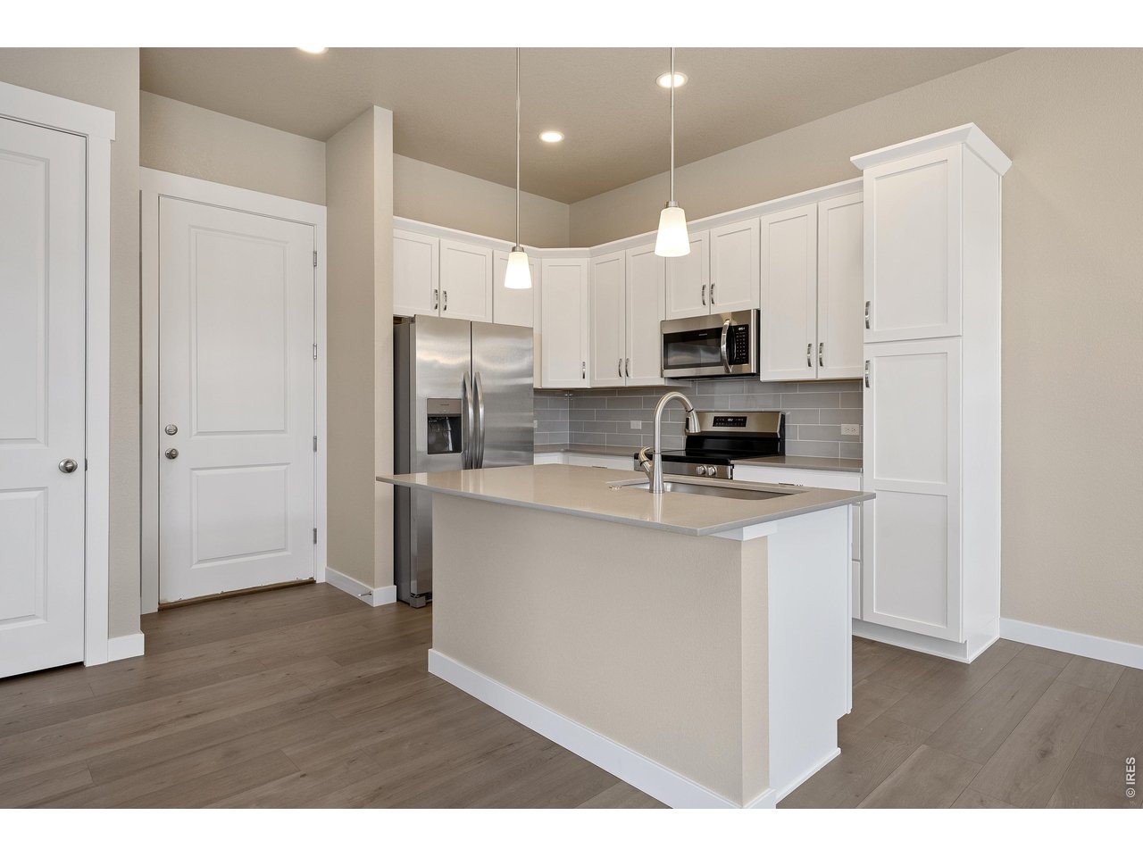 New construction ranch condo by Landmark Homes in Longmont CO. Discovery at Highlands at Fox Hill. The Timberline, featuring 1,567 sf finished, 3bd, 2.5 bath,2-car attached garage. Bright, open floor plan w/ oversized primary suite w/ dual vanities, separate water closet, walk-in closet & covered porch. Flex space perfect for reading nook or home office. Maintenance-free homeownership. Luxury finishes include upgraded painted cabinets, quartz counters, stainless appliances including refrigerator, farmhouse sink, 10' ceilings throughout, LVP flooring extended into living room, tile surrounds, tankless water heater & high-efficiency furnace. Complimentary 1-year social membership to Fox Hill Country Club included. Minutes to Main Street Longmont, St. Vrain Greenway, Union Reservoir & Fox Hill Golf Course. Easy commute to Boulder. Ideal for first-time buyers, downsizers & investors. Pre-sale & move-in ready options available. Schedule your private tour & visit our model at 255 High Point Dr G #104, Longmont CO 80504.