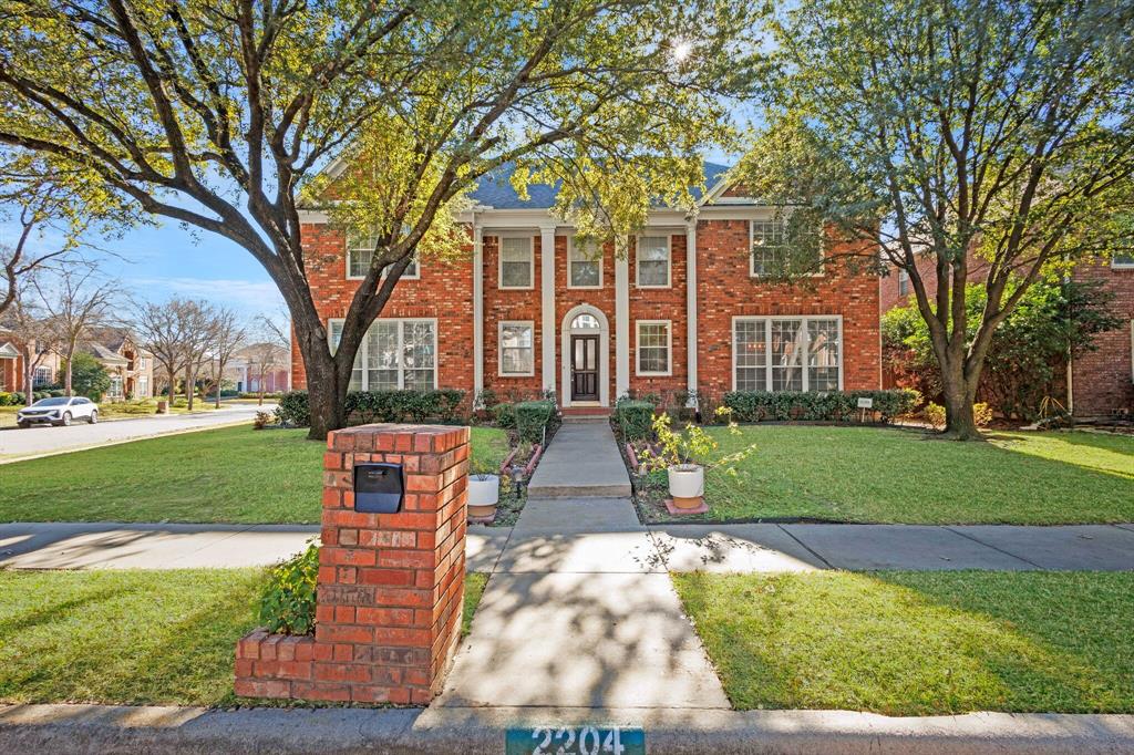 Welcome to this stunning corner-lot home in the exclusive gated golf community of Hackberry Creek. Surrounded by mature trees and Lush landscaping, this unique estate offers both elegance and comfort.  Step into a dramatic two story foyer featuring a grand staircase and detailed crown molding throughout the main level. The beautiful kitchen features granite countertops, double ovens, and a cozy breakfast nook-perfect for casual mornings or entertainment. Unwind in the formal living room by the lovely fireplace or retreat to the luxurious primary suite with a spa-like bath, including jetted tub, walk-in shower, dual vanities, and generous storage. Upstairs, you will find a spacious secondary living area, four oversized bedrooms, and two full bathrooms-ideal for family or guests. A dedicated home office and inviting back patio add to the functionality and charm of this well-designed floor plan. Enjoy convenient access to top shopping, dining, golf courses, entertainment, and DFW Airport-just a quick drive away. This home offers the perfect blend of privacy, comfort and location.