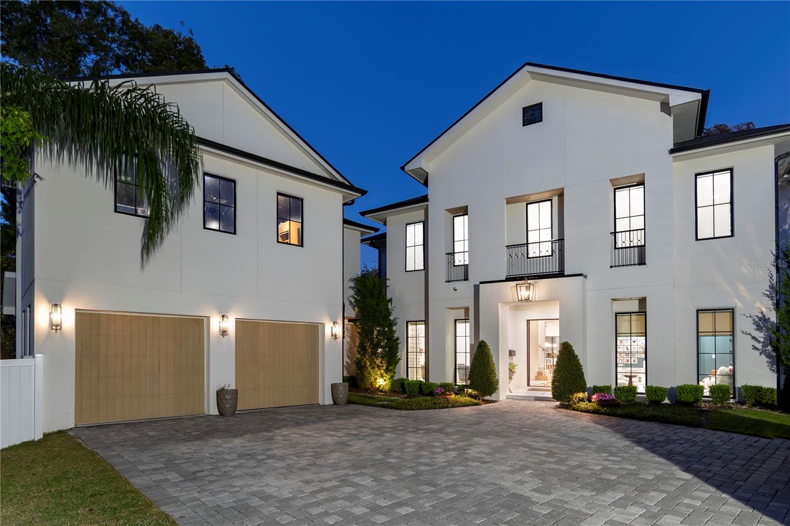 Under contract-accepting backup offers. This stunning private residence is on an oversized lot featuring a private sports pad, kids playground and sparkling pool. Encompassing over 6,700 square feet of expansive .55-acre lot, this home boast five spacious bedrooms, one office, 5.5 baths and a dedicated movie room, recording studio and a fully equipped gym with a private sauna. Ideally just moments from serene Lake Maitland and the charming Azalea Park, this home offers natural beauty and prime location. The chef's kitchen is designed for function and style with dual oversized islands, ideal for entertaining and everyday living. Spacious, inviting and thoughtfully designed, this oversized family room is the heart of the home-ideal for everything from cozy movie nights to lively holiday parties featuring expansive square footage, the room comfortably accommodates large groups, with plenty of space for multiple seating areas and a bar area. Oversized windows flood the space with natural light while the high ceilings and an open layout enhance the airy welcoming feel. Whether you are hosting extended family or entertaining friends, this room is built for connection, comfort and lasting memories. The private recording studio can be turned into a private mother-in-law suite or a kids playroom. The luxurious primary suite retreat to your own private oasis featuring a cozy fireplace, direct access to a serene private porch and a one-of-a-kind walk-in closet designed for style and functionality. The oversized en-suite bath boasts a steam shower, creating a spa-like experience right at home. Two additional en-suite bedrooms upstairs, each with walk in closets. Thoughtfully designed for convenience, this home features a spacious mud room off the garage which is ideal for busy households.   Enjoy the ultimate convenience with two separate laundry rooms, one’s downstairs for easy access and a second upstairs near the bedrooms, making laundry day effortless and efficient. Ideally near Winter Park Racquet Club, Interlachen Country Club and accessible to Park Avenue, this exceptional residence also offers an extraordinary residence with a luxurious functionality and a premier location.