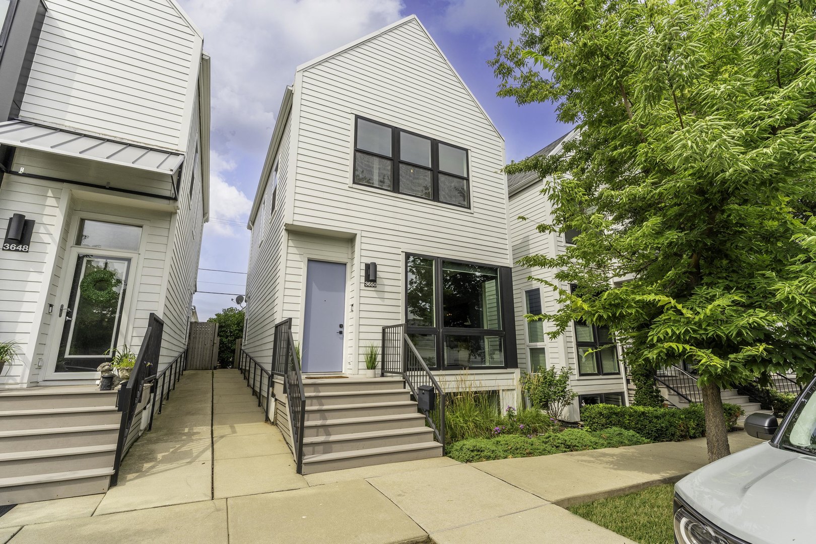 Modern Sophistication Meets Neighborhood Charm in Award-Winning Basecamp Old Irving Park. Discover the perfect blend of style, space, and location in this exceptional modern farmhouse. One of the most desirable floor plans in the acclaimed Basecamp community.. Thoughtfully crafted by Ranquist Development and designed by Pappageorge Haymes Architects, this residence offers an inspired take on modern urban living. Step inside and be greeted by 10-foot ceilings, expansive windows that bathe the home in natural light, and rich hardwood floors that flow throughout. The open-concept main level is built for both entertaining and everyday ease, featuring a sleek powder room and a chef-worthy kitchen with custom cabinetry, premium stainless steel appliances, an oversized island, pull-out drawers, open shelving, and elegant finishes throughout. Seamless indoor-outdoor living awaits with a beautifully landscaped, private brick patio backyard that is ideal for entertaining, relaxing, or letting the kids play. Upstairs, the serene second level boasts vaulted 16-foot ceilings in all three generously sized bedrooms, tons of light from the  wall to wall windows and more gorgeous hardwood flooring throughout. The primary suite is a calming retreat, complete with eastern morning light, a walk-in closet, and a spa-inspired ensuite with an oversized glass shower. The fully finished lower level adds incredible flexibility, with a large recreation room, a fourth bedroom, a full bathroom, and ample storage-perfect for guests. However, this home offers more than just beauty inside...it's about lifestyle. Step out your door and into a private community park, or explore the hidden gem that is Old Irving Park-a neighborhood where tree-lined streets meet unbeatable city access. Walk just 2 minutes to the Metra Grayland stop (be at Union Station in 16 minutes), or head .8 miles to the CTA Blue Line. The Kennedy Expressway is just around the corner, making commuting a breeze. You're also steps from Kilbourn Park, with 6 Corners' exciting wave of new retail and dining just to the north, and the energy of Logan Square and Avondale just to the south. A private community playground and local charm complete the picture. This is more than a home-it's a lifestyle upgrade. Don't miss your chance to own a standout property in one of Chicago's most exciting and fast-growing neighborhoods.
