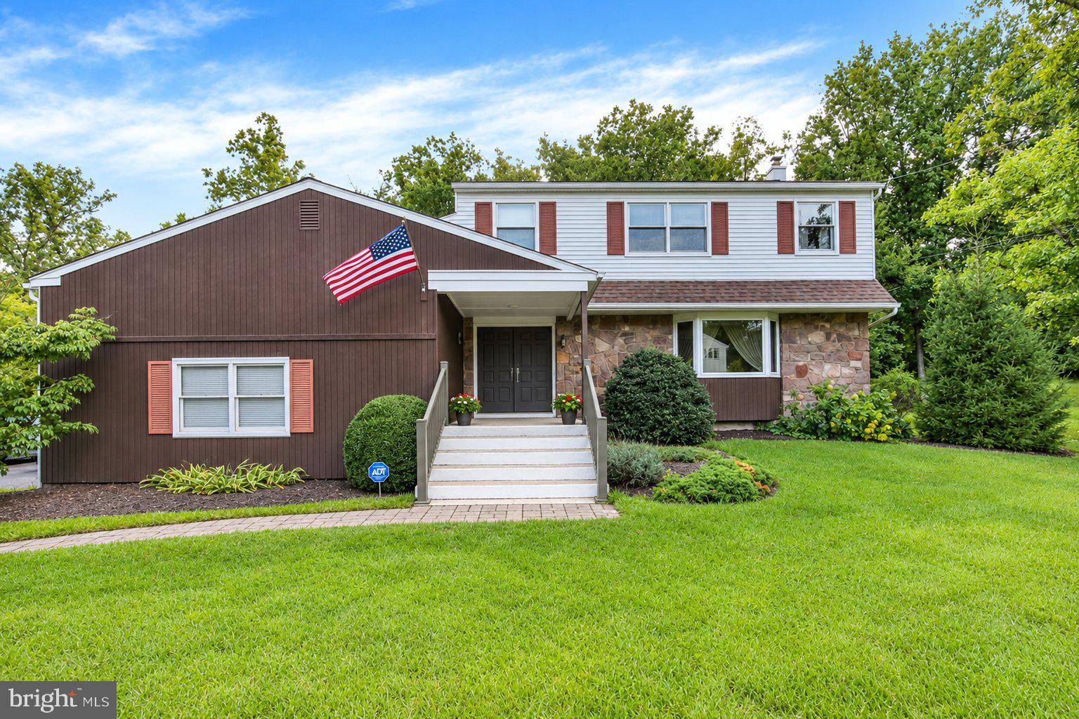 Welcome to a custom built home that has been thoughtfully cared for and updated through the years, offering the space, comfort, and setting that make a house feel like home. Set on .90 acres in the Downingtown Area School District, this four bedroom, two and a half bath home has been a place where life has happened, memories have been made, and every generation has had room to enjoy it. The 18 by 22 family room is one of the home's standout spaces, featuring a wall to wall fireplace that creates a warm and inviting gathering place. Hardwood floors are found throughout the home and have been carefully protected over the years beneath wall to wall carpeting and room sized rugs. The kitchen offers double ovens and plenty of space for preparing everyday meals or hosting holidays and special occasions. The home continues to shine outdoors with a wonderful 20 by 16 screened porch featuring a vaulted ceiling and skylights. Open the door and the living space naturally extends outside, creating a peaceful spot for morning coffee, summer evenings, or gatherings with friends. The generous yard backs to woods, providing a private and natural backdrop to enjoy the property. The first floor offers the convenience of a laundry room, while the two car garage provides additional storage through a crawl space. The unfinished basement offers even more possibilities, with both interior and exterior entrances providing convenient access. Independent heating and air conditioning systems add another practical feature to the home's design. Years of thoughtful maintenance and improvements provide peace of mind for the next owner. The roof was replaced in 2023 with 50 year Owens Corning shingles. The primary bathroom was remodeled in 2025, along with chimney re stucco work and a new liner for the furnace chimney. The main bathroom was remodeled in 2019, and the powder room was remodeled in 2015. Additional improvements include Anderson 400 Series windows and a sliding glass door with internal blinds installed in 2016, a Burnham furnace installed in 2016, and a Bryant air conditioning system installed in 2010. In 2002, the wood trim was capped and a new gutter system was installed. There is something special about a home that has been cared for over many years. This is a home with a history, a comfortable setting, and plenty of space for whatever comes next. Now, after years of being loved and enjoyed, it is ready for a new owner to begin the next chapter.