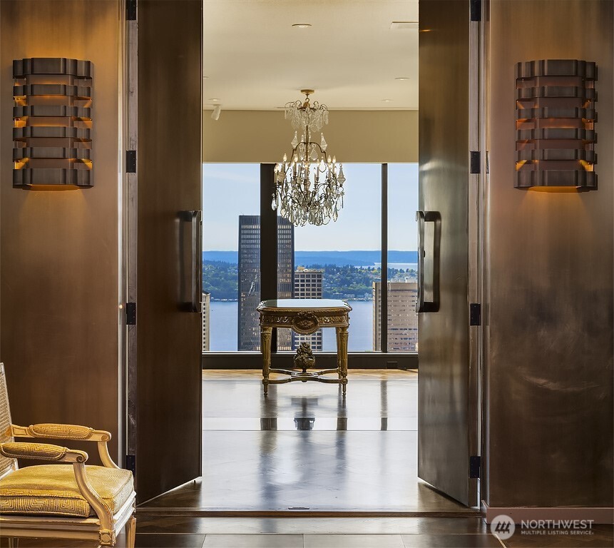 Seize a once-in-a-lifetime opportunity to own the most desirable Penthouse in Seattle: a 7,000 sq ft award-winning property towering over Seattle’s skyline with 360-degree views of the Space Needle, Olympic & Cascade mts. Lake Washington, Bellevue & Elliott Bay. This full-floor residence features high ceilings throughout with walls of glass creating a seamless connection between the interior and the city skyline. This property boasts a meticulously appointed fully-equipped guest/housekeepers suite, library, private elevator and lobby, bespoke bronze wet bar, gym, two terraces and 6 secured parking stalls. Residents enjoy amenities including indoor pool, spa, tennis court, patrolled security & 24/7 concierge.