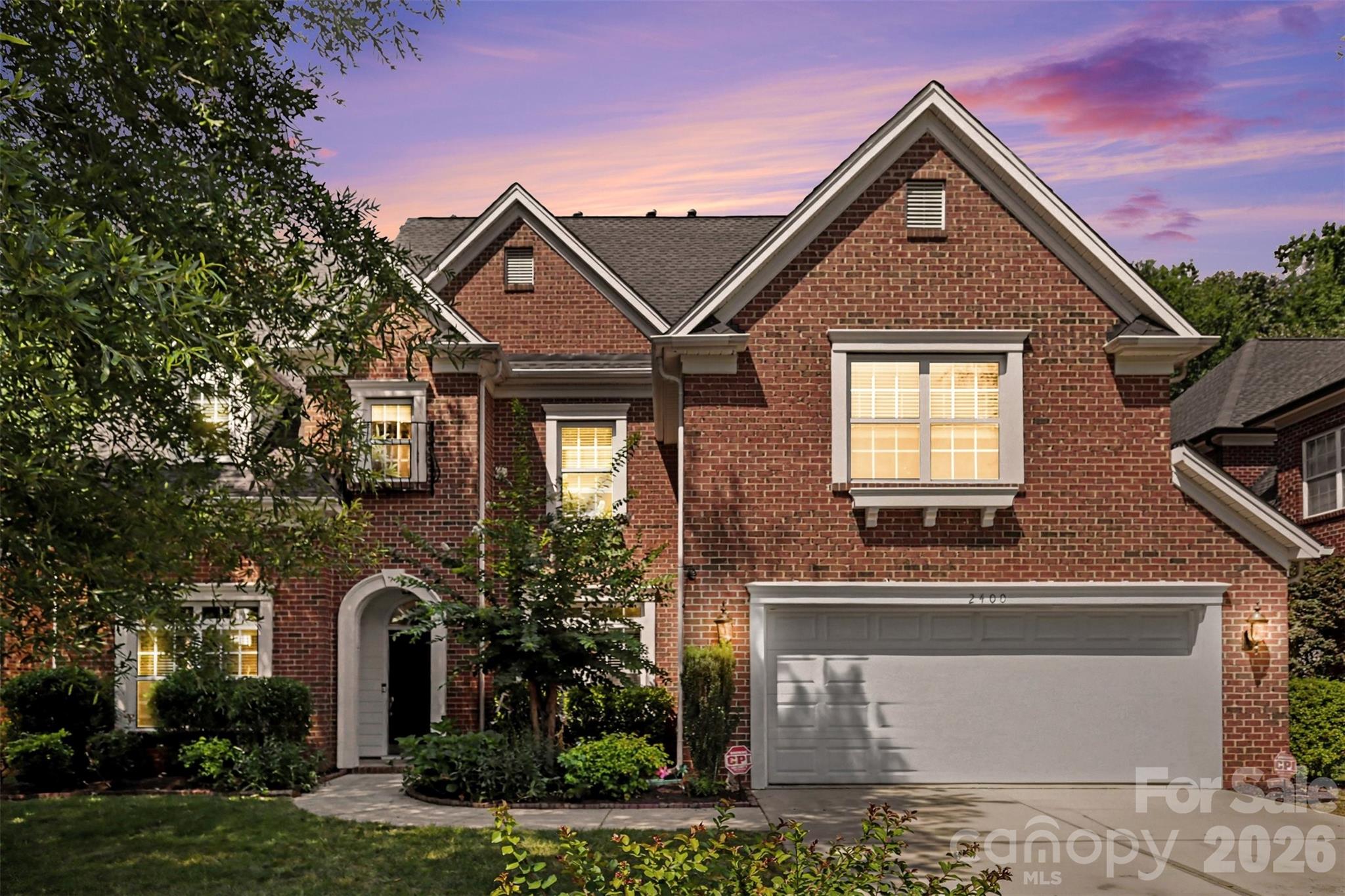 Beautiful move in ready full-brick home located on PREMIUM lot backing to woods located in the highly sought-after Barrington community! This stunning 5 bedroom, 3.5 bathroom residence boasts over 4000 sq ft of spacious and open living space with great natural lighting. The floorplan has grand 2 story great room featuring a wall of windows and gas fireplace with built-in cabinets. This classic gourmet kitchen boasts a ton of cabinets, chef's island, Micro/Oven Wall Unit, BRAND NEW dishwasher, gas cooktop, granite, tile backsplash, dry bar/office station. Formal Dining Rm, Home Office, flexible area and breakfast area on main. An expansive third floor bonus room, a private bedroom and a full bathroom—perfect space for entertaining, guest or multigenerational living. The house has plenty of upgraded: BRAND NEW CARPET just installed; ROOF 2018; 1 AC unit installed in 2023; master bathroom and secondary bathroom upgrade in 2020; relatively new painted first floor and third floor; master closet and secondary closet customize shelves installed; Tesla charger installed in the garage. Barrington's top-notch amenities include a pool, basketball and tennis courts, and scenic walking trails. Minutes from downtown Waxhaw and top-rated Marvin Ridge schools. Convenient to shopping, community activities, and I-485.