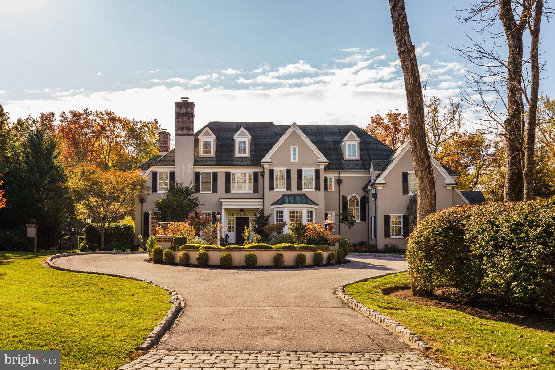 Introducing an opportunity within the premier enclave of estate homes on Boxwood Road—this distinguished 7-bedroom manor residence, crafted by award-winning Pohlig Builders, is ready for its next chapter. Positioned on a magnificent 1.44-acre level this Fenimore model offers exceptional scale, craftsmanship, and a floor plan designed for both grand entertaining and everyday living. While being offered as-is, the home presents an extraordinary opportunity for the next owner to bring fresh vision to an already impressive foundation. Architectural highlights include a paneled library, expansive formal and informal living spaces, and a thoughtfully arranged kitchen. Second floor host the primary wing, two junior suites, and a two guest beds with shared bath. The finished third floor provides two additional bedrooms and a full bath. The lower level is appointed with a fireplace, wet bar, wine room, exercise room, craft room, with full bath, offering flexible informal spaces. The setting is both private and picturesque, with mature landscaping that frames the residence beautifully. The proportions, craftsmanship, and coveted location create the only opportunity to renovate, refresh, and tailor an estate to your personal needs.In a marketplace where land, location, and quality construction are essential, this property represents a chance to secure a premier Main Line address and transform a substantial Pohlig-built home into a legacy property for years to come.