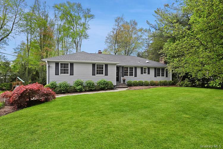 Welcome to 110 The Farms Road Bedford, this coveted neighborhood has it all. Nestled in the heart of The Farms, this home is perfectly situated within walking distance to Bedford Village where you will find an array of boutiques, cafes, restaurants, The Bedford Playhouse as well as the town park with pools and tennis courts.
Entertaining is easy on the newly refurbished deck overlooking the green lawns and tree tops with wonderful privacy - it is a great place to gather with friends and family. This picture perfect property has easy one-level living with a main suite and has been thoughtfully updated throughout. On the first level, you will find an additional two bedrooms and main hall bathroom, a separate dining room with a formal living room plus a den off the kitchen. With three working fireplaces, you can curl up and be cozy in the winter time. This home comes with a finished light-filled basement, mudroom area off the garage, cozy den and/or playroom. Work from home in the sun filled home-office. The oversized 2 car garage also offers extra storage space in addition to the attic.
This beautiful home truly has it all in a wonderful location in Bedford Village where country beauty awaits you.