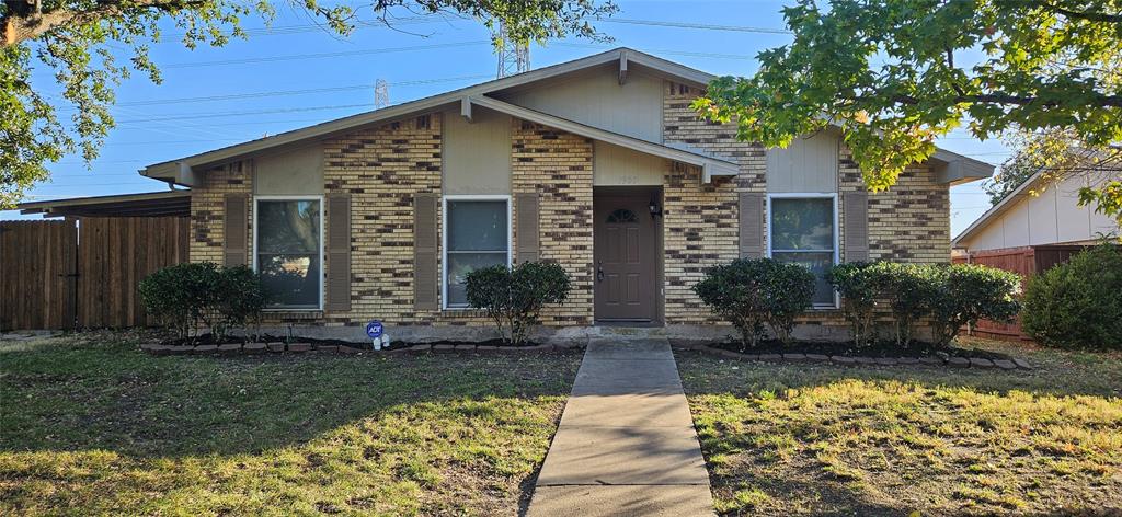 Special: Pay only half price for your first months rent. Adorable 3 bed 2 bath home on corner lot. Spacious Living with attractive brick wood burning fireplace. Galley Style Kitchen with Stainless Steel Appliances and Granite Counter Tops. All new paint throughout interior.  New Living and Dining Room Wood Styled vinyl flooring.  2 car rear alley entrance garage with automatic opener.  Cozy covered porch with swing in large corner lot backyard.Step outside & take a walk in neighboring park or Bluebonnet Trails! Buyer to verify all measurements. A must see! Applicants must use New Home Connections Lease Application Forms to apply.