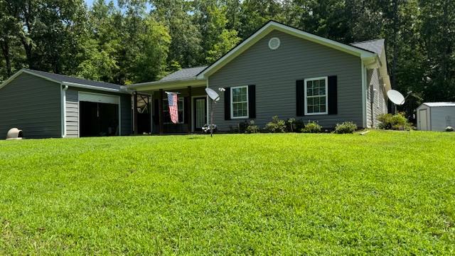 Almost New Home close to Lake Hiwassee sitting on approximately 9.43 beautiful wooded acres that join USFS. This 3 bedroom 2 bath ranch home was built in 2022 with vinyl siding to help on maintenance, aluminum seamless gutters, double pane windows and  has a beautiful yard. 2 car deatched metal carport with workshop/garage area and a seperate shed. The inside boasts custom painted cabinets, nice island and granite countertops. Luxury vinyl flooring, roman arch top doors, heat pump and a 16x42 bonus room with pool table and wet bar. This home is move in ready.  There are some furnishings that will be conveyed with this home such as beds, dishes, tv's, sectional sofa, pool table and other items. Appliances included are Range, Refrigerator, Dishwasher, Microwave, Washer, Dryer and a small Freezer in the shed. This is an ABSOLUTE must see home. Priced at $389,900.00