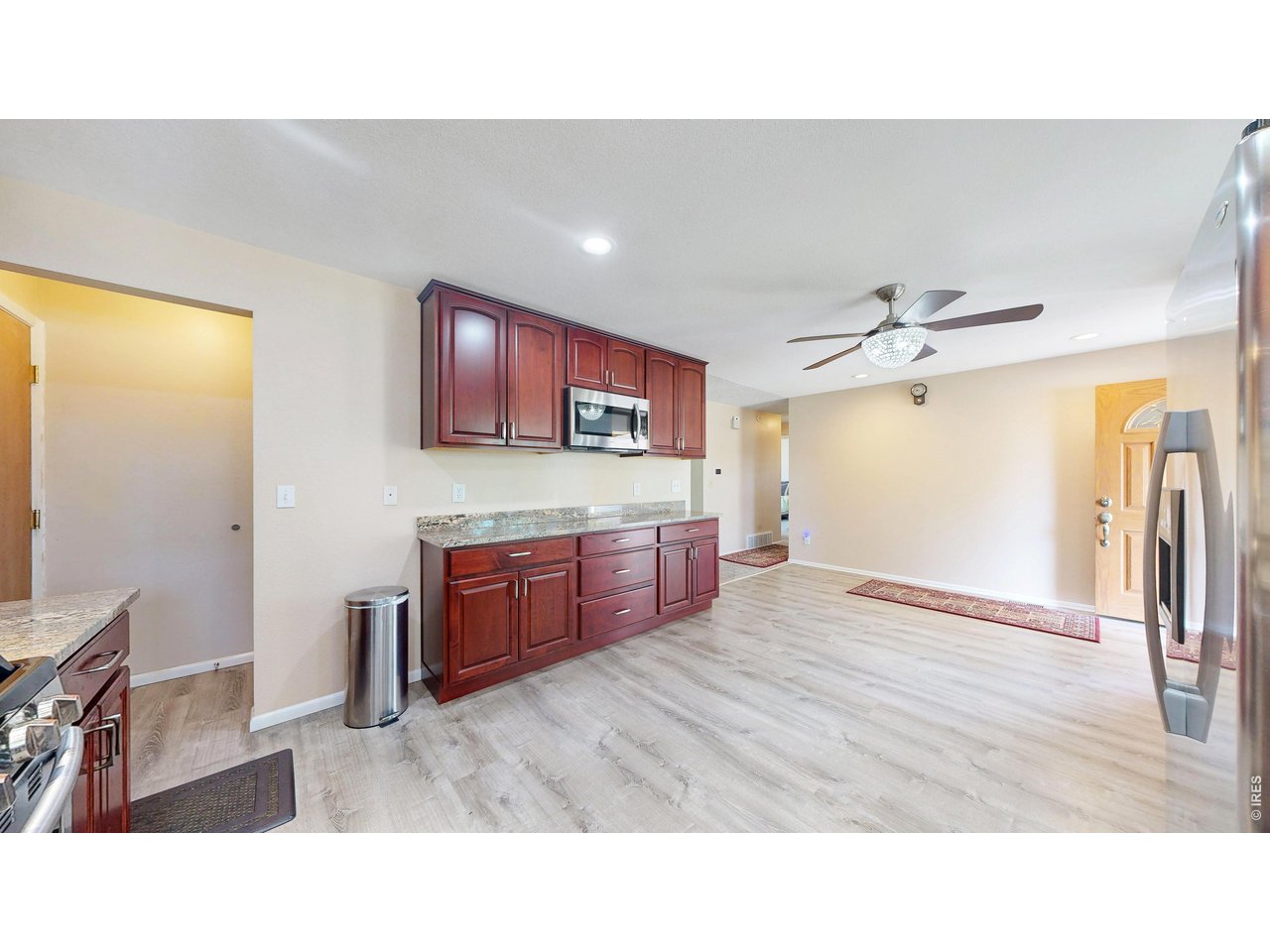 Spacious 5-bedroom, 3-bath home with a 2-car garage tucked away on a quiet cul-de-sac in desirable Arvada. Situated on a large lot filled with abundant natural light, this home backs directly to scenic bike paths and walking trails with convenient access to nearby parks, open space, and outdoor recreation. Inside, the welcoming family room features a cozy fireplace - the perfect place to unwind with movie nights, morning coffee, or relaxing evenings by the fire. The thoughtfully designed layout offers generous living areas, flexible space for entertaining or working from home, and plenty of room for gatherings both large and small. Step outside to enjoy the peaceful backyard setting with direct trail access, ideal for biking, walking, jogging, or simply enjoying Colorado's outdoor lifestyle right from your own backyard. Whether you're hosting friends, spending time with family, or looking for a quiet retreat at the end of the day, this home combines comfort, warmth, functionality, with a newer Furnace and A/C unit. Conveniently located near shopping, dining, schools, and commuter routes, this home offers the perfect balance of privacy, space, and accessibility.